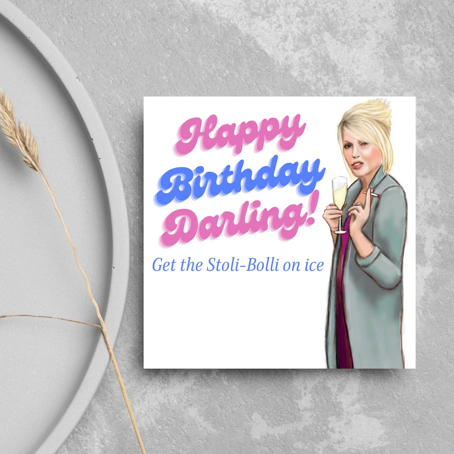 Image of a square greetings card against a grey background. The design is Patsy from Absolutely Fabulous with pink and blue text 'happy birthday darling, get the stoli-bolli on ice"