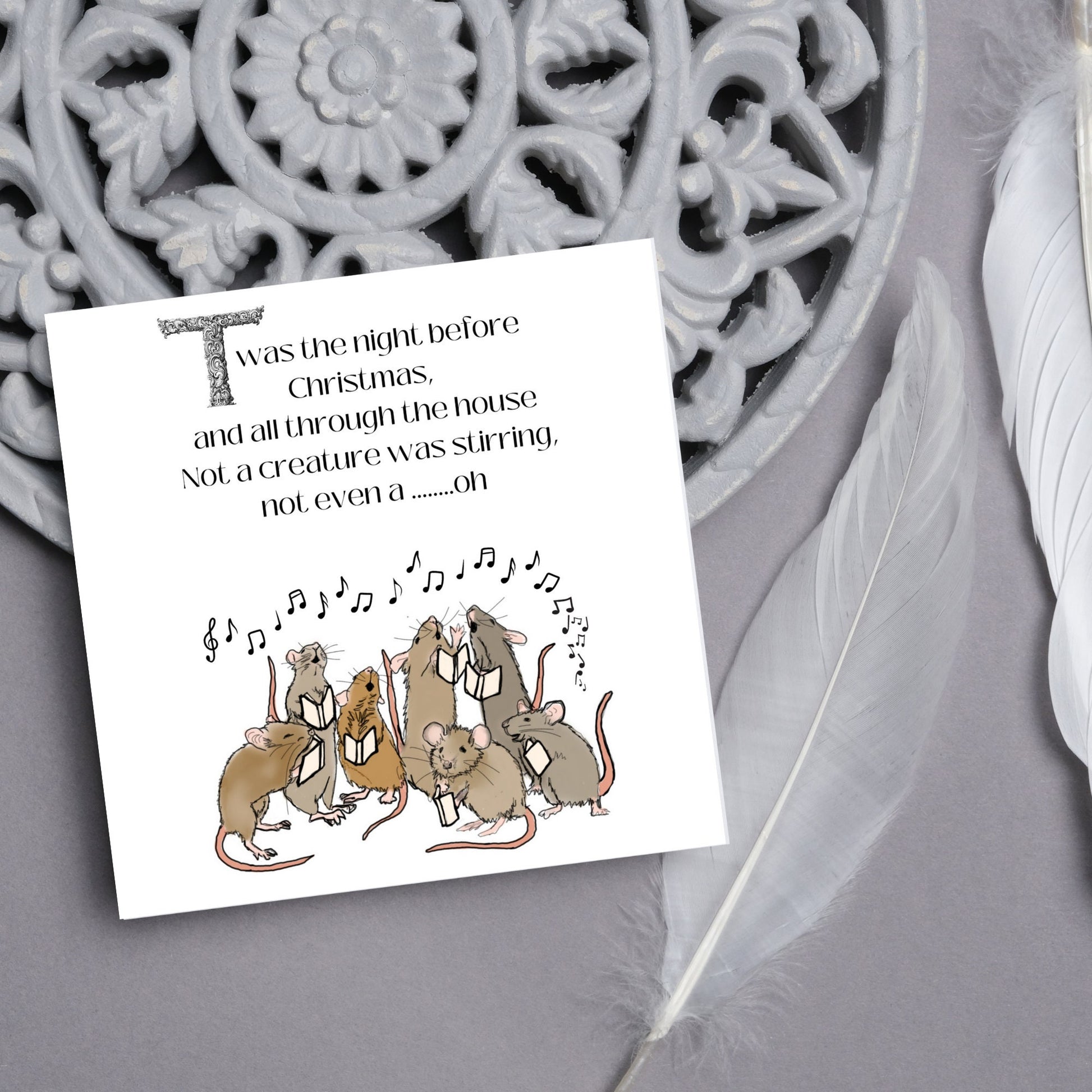 Cute mouse Christmas Card.Large Square sized christmas card with singing mice sining twas the night before christmas and all through the house not a creature was stiring not even a mouse. A christmas carol, Charles Dicken design