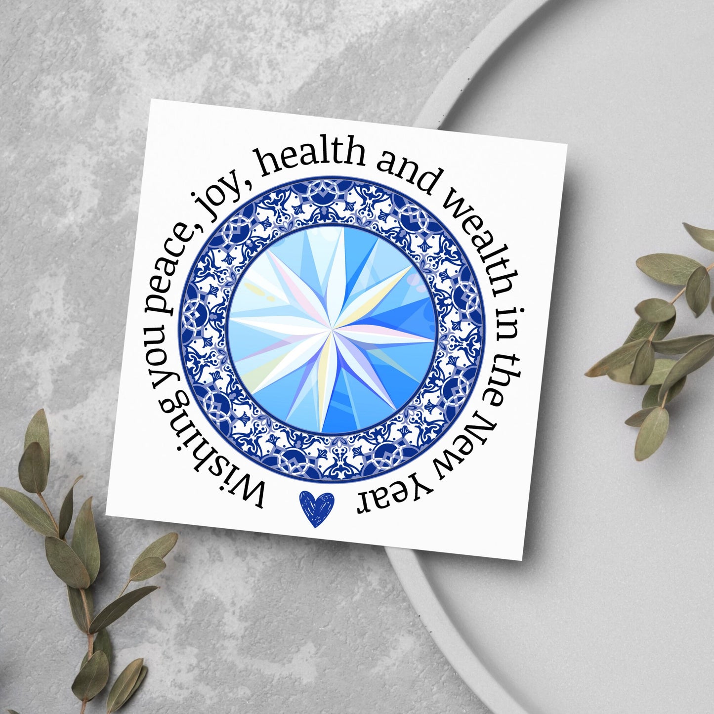 New years greeting card with the words "wishing you peace, joy, health and wealth in the new year". blue celtic circle design. card for him, card for her, solstice card