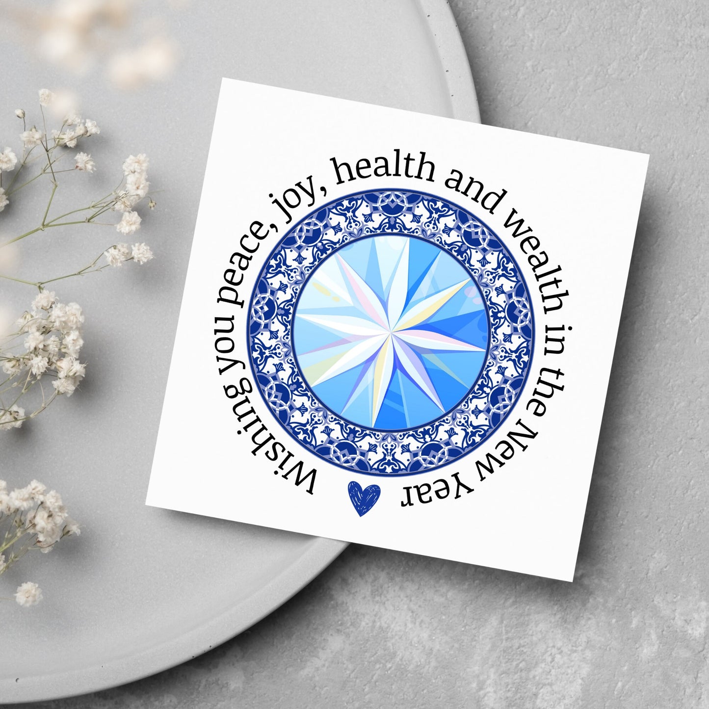 New years greeting card with the words "wishing you peace, joy, health and wealth in the new year". blue celtic circle design. card for him, card for her, solstice card