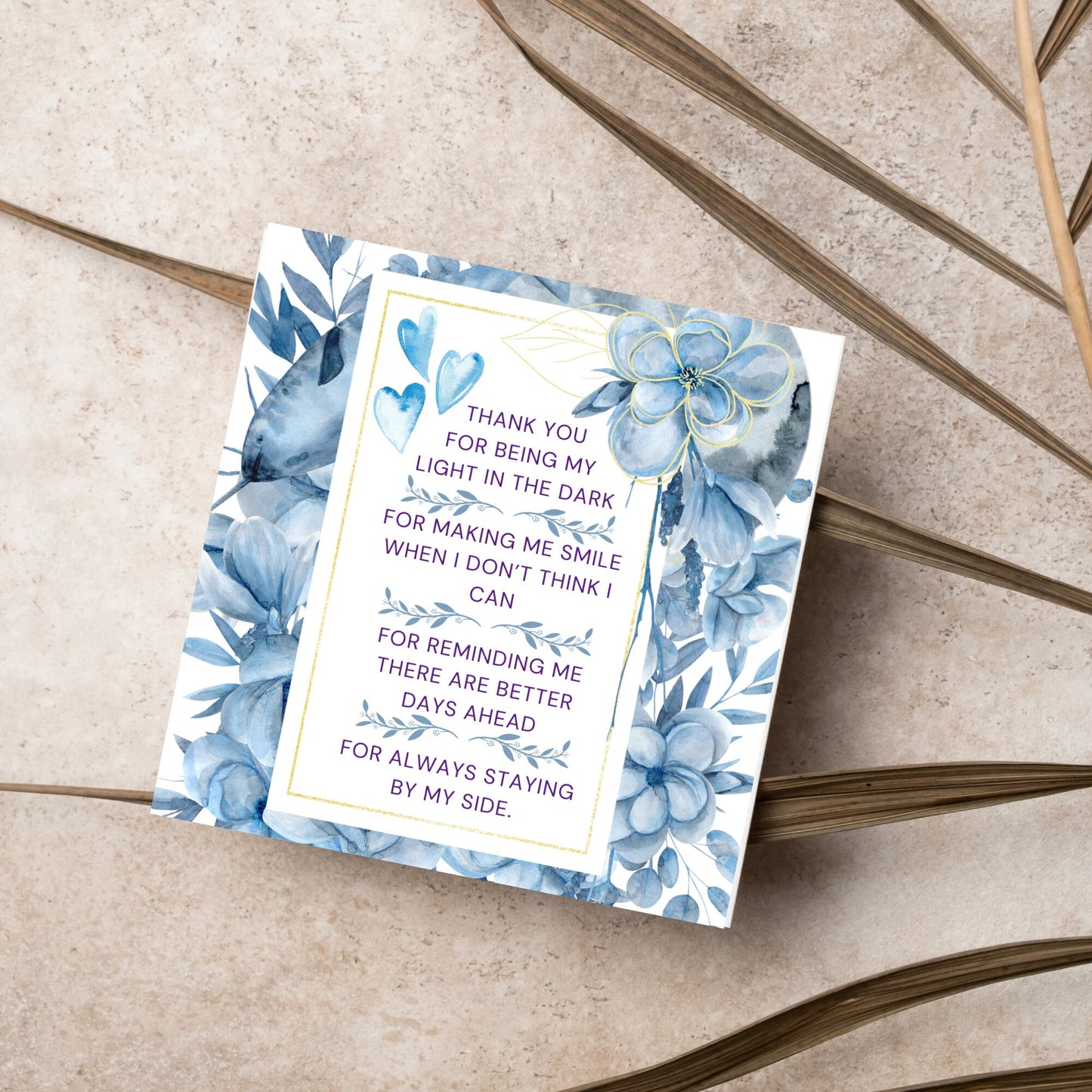 Square friendship card with "Thank You for being the light in the dark
For making me smile when I don’t think I can
For reminding me there are better days ahead
For always staying by my side" framed with blue watercolour flowers & hearts