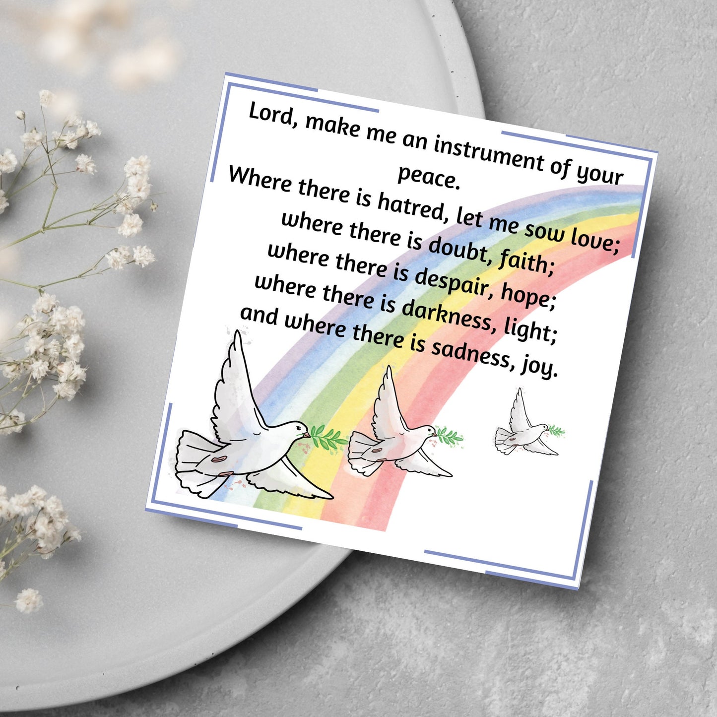 Square greetings card with 3 flying peace doves against a rainbow, with the Prayer of Saint Francis text Lord, make me an instrument of your peace.