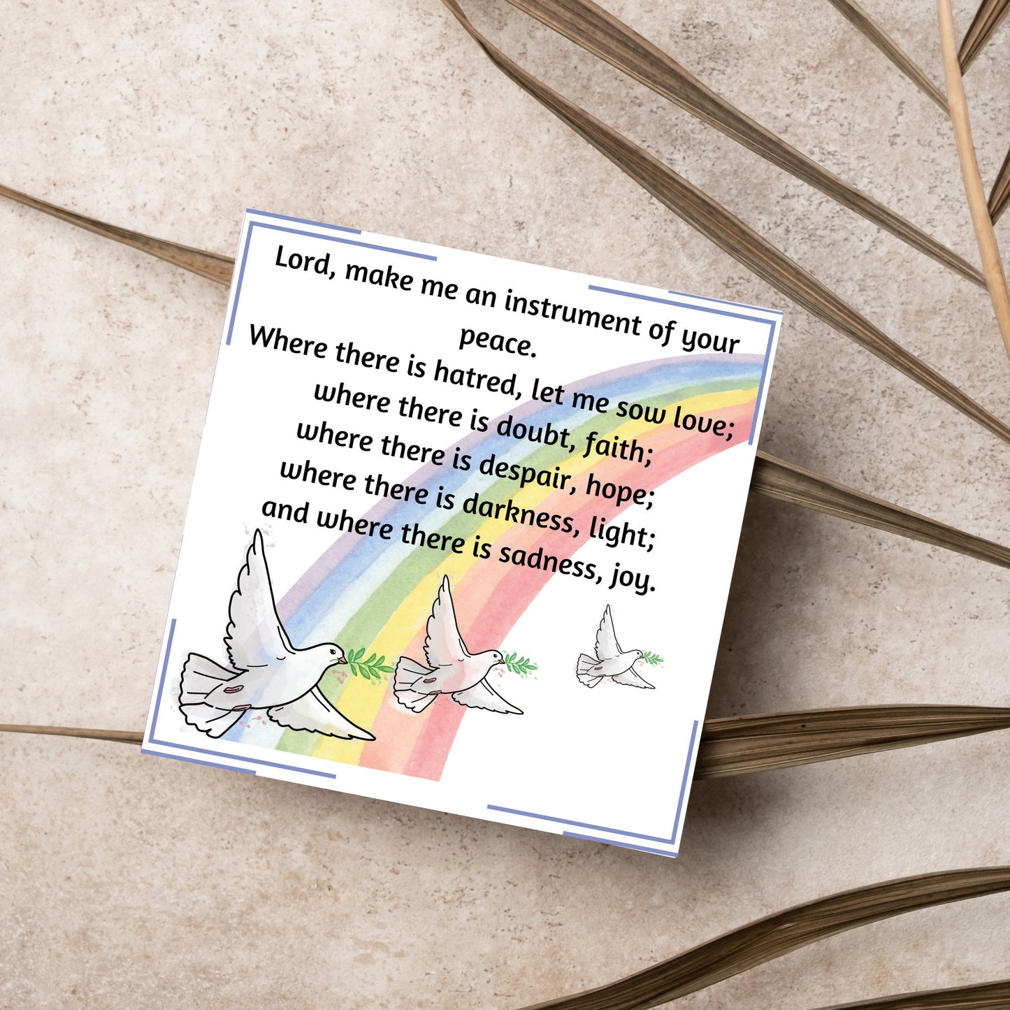 Square greetings card with 3 flying peace doves against a rainbow, with the Prayer of Saint Francis text Lord, make me an instrument of your peace.