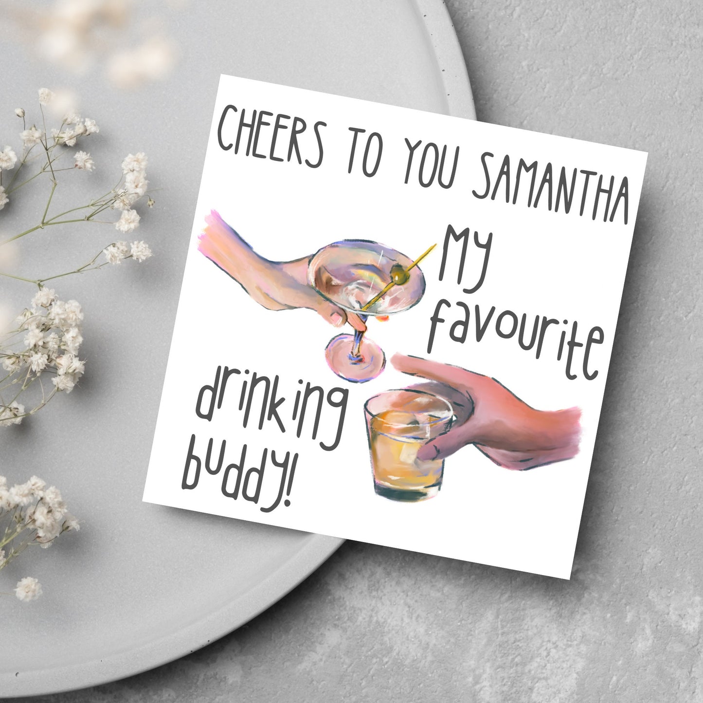 Square card with watercolour design of 2 hands holding drinks glasses against a white background, with grey text that reads "cheers to you Samantha, my favourite drinking buddy"