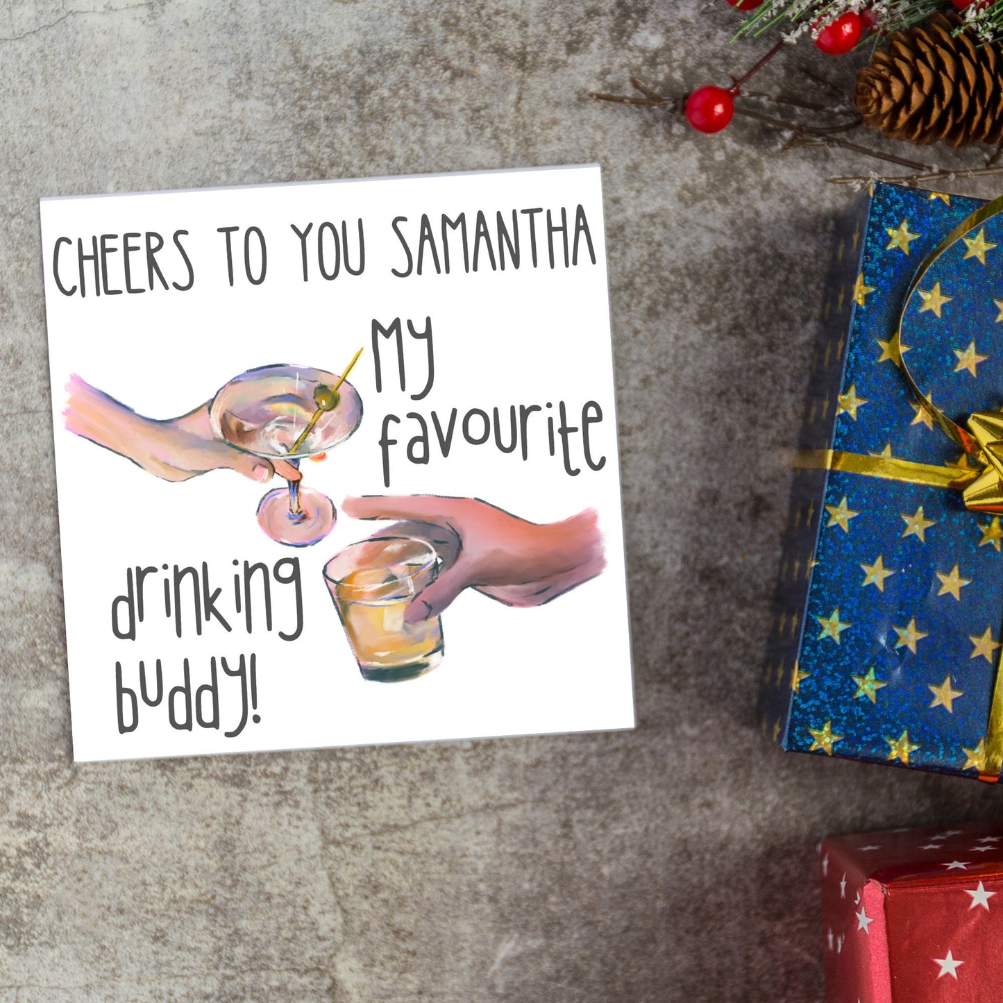 Square card with watercolour design of 2 hands holding drinks glasses against a white background, with grey text that reads "cheers to you Samantha, my favourite drinking buddy"