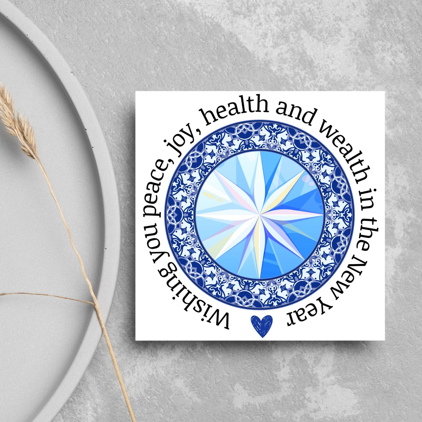 New years greeting card with the words "wishing you peace, joy, health and wealth in the new year". blue celtic circle design. card for him, card for her, solstice card