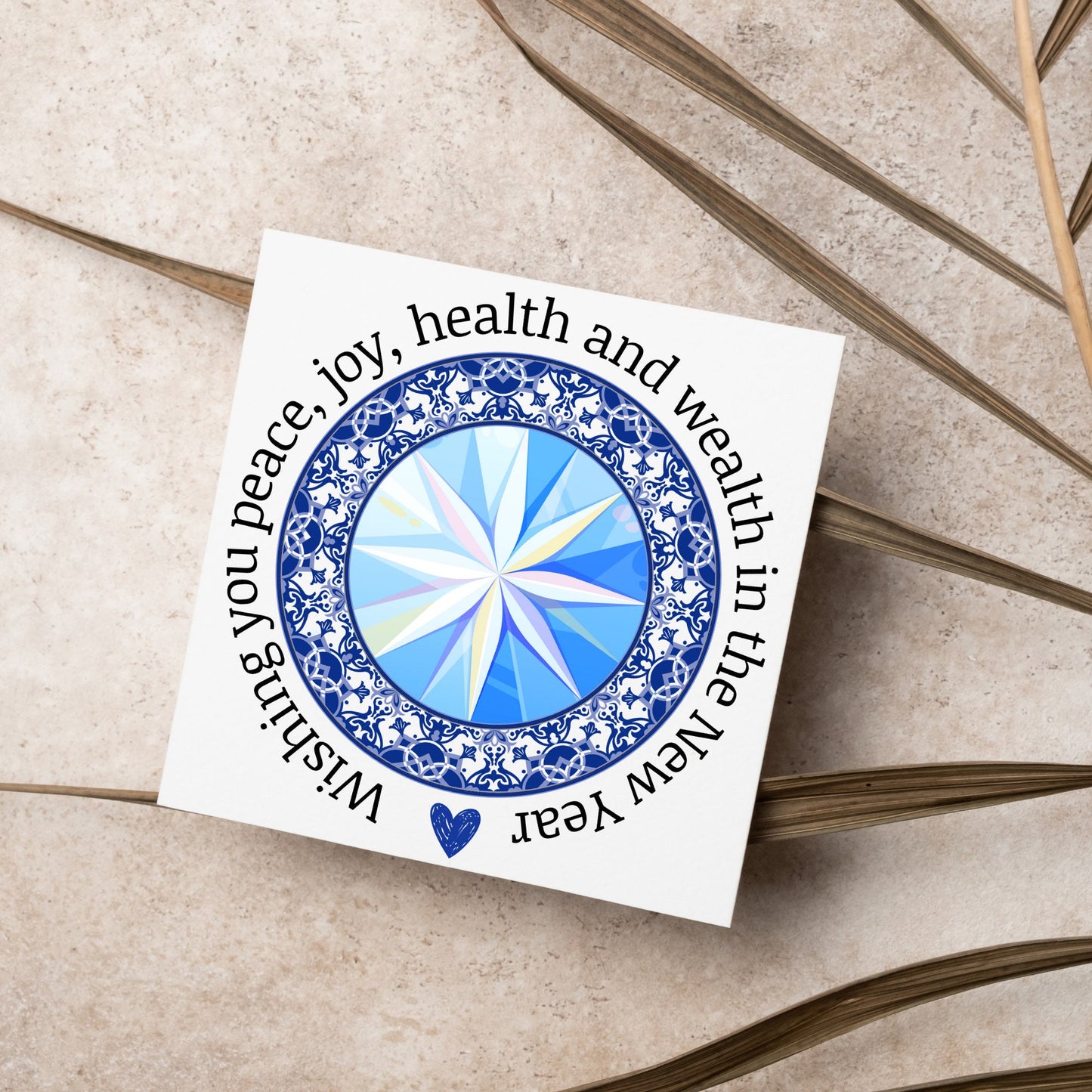 New years greeting card with the words "wishing you peace, joy, health and wealth in the new year". blue celtic circle design. card for him, card for her, solstice card