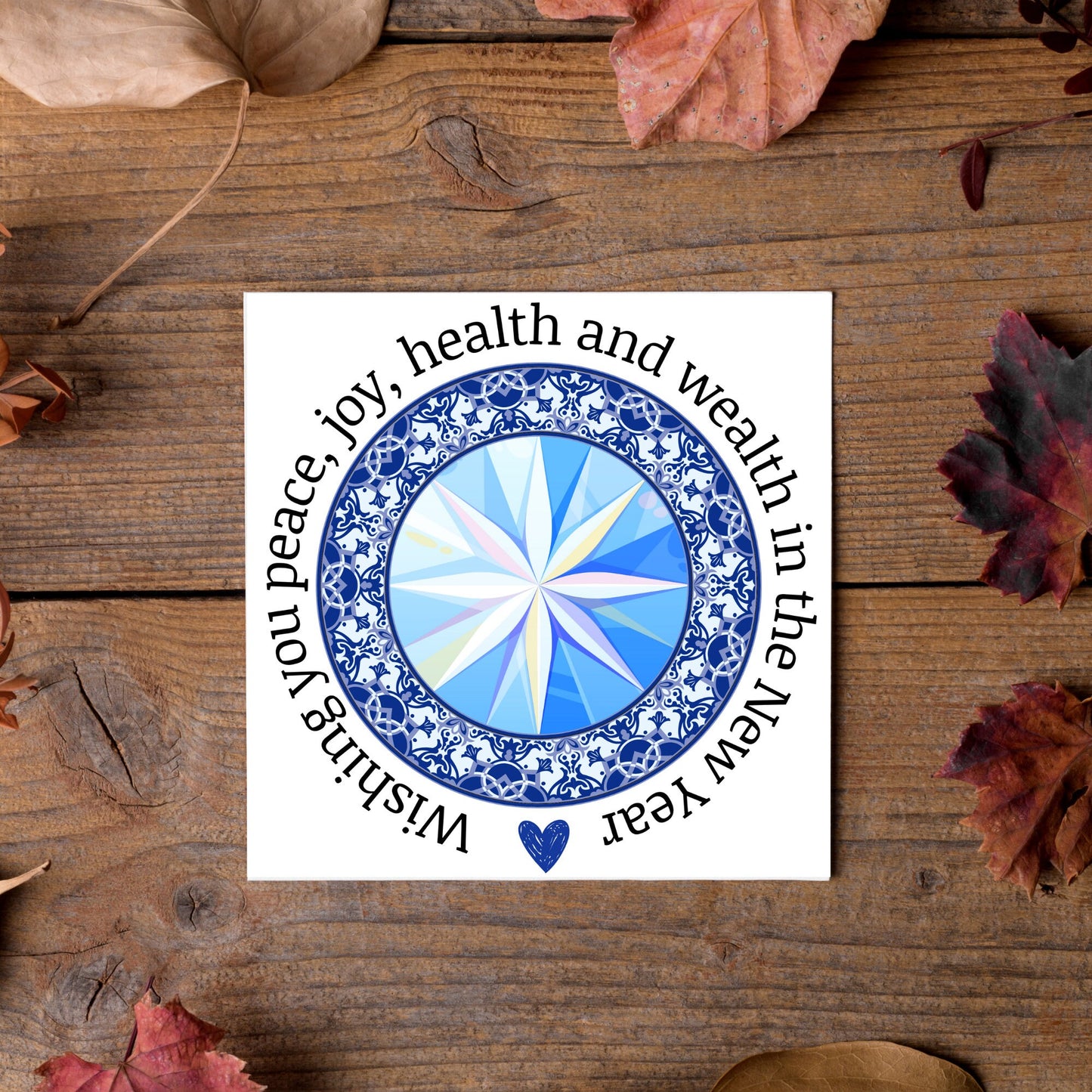 New years greeting card with the words "wishing you peace, joy, health and wealth in the new year". blue celtic circle design. card for him, card for her, solstice card