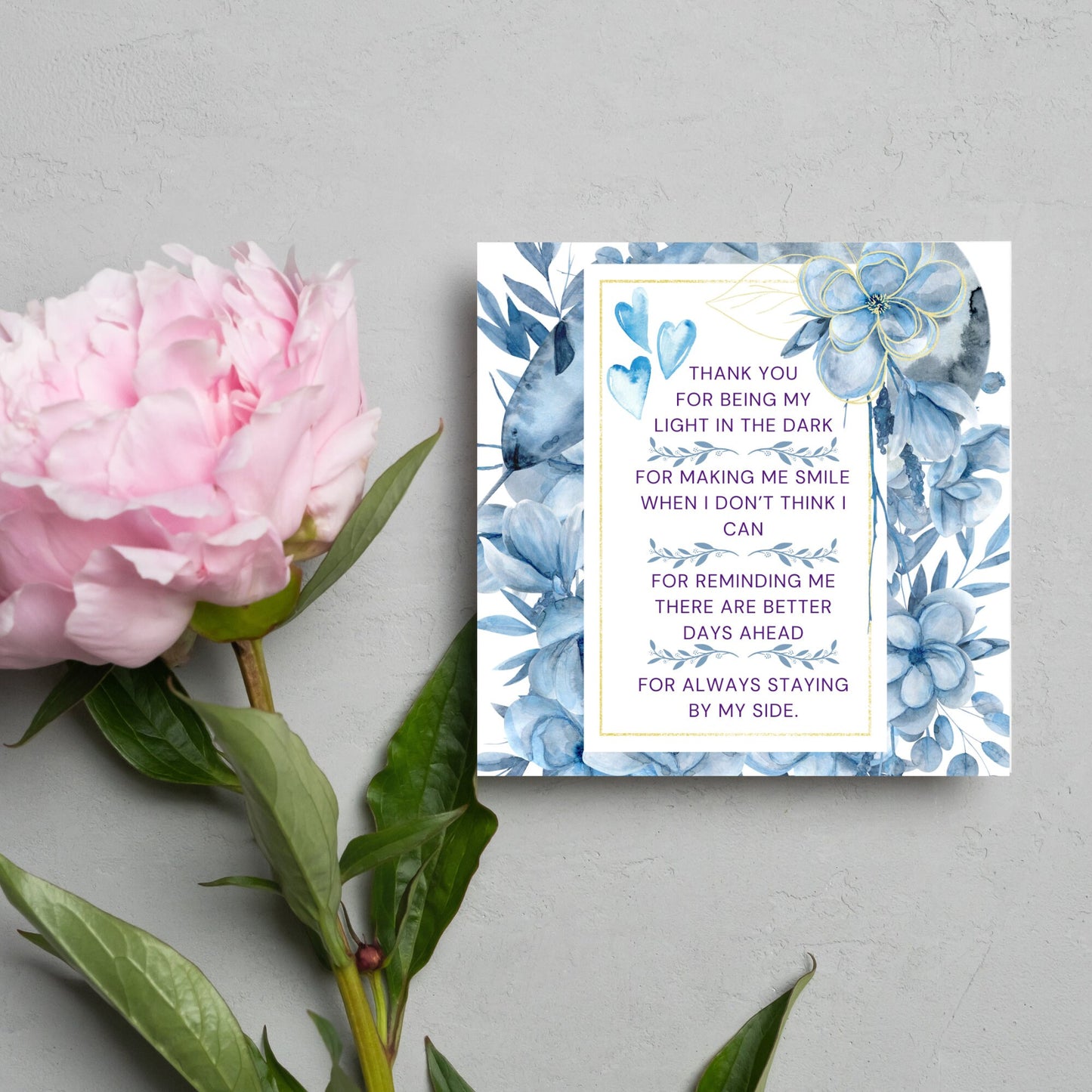 Square friendship card with "Thank You for being the light in the dark
For making me smile when I don’t think I can
For reminding me there are better days ahead
For always staying by my side" framed with blue watercolour flowers & hearts