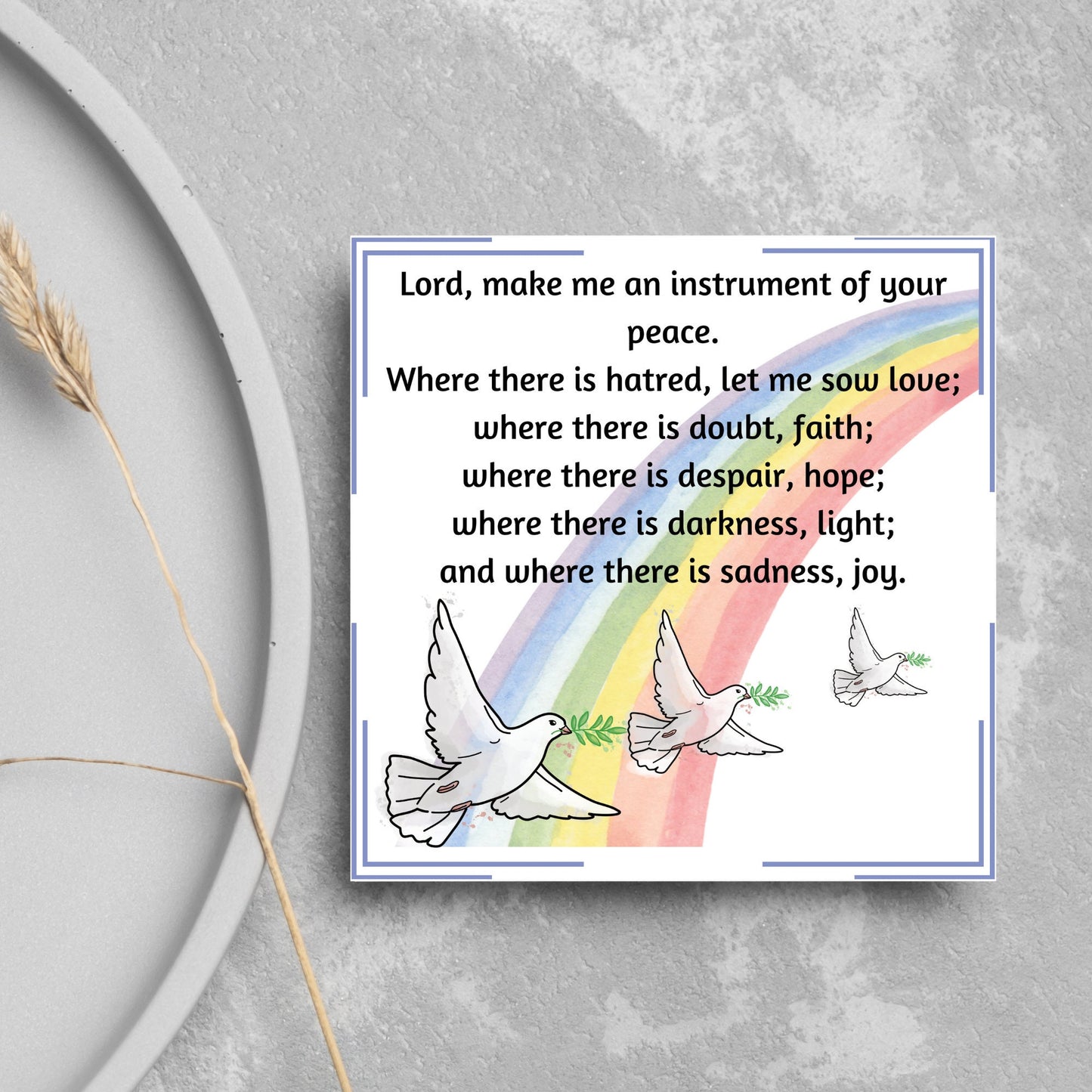 Square greetings card with 3 flying peace doves against a rainbow, with the Prayer of Saint Francis text Lord, make me an instrument of your peace.
