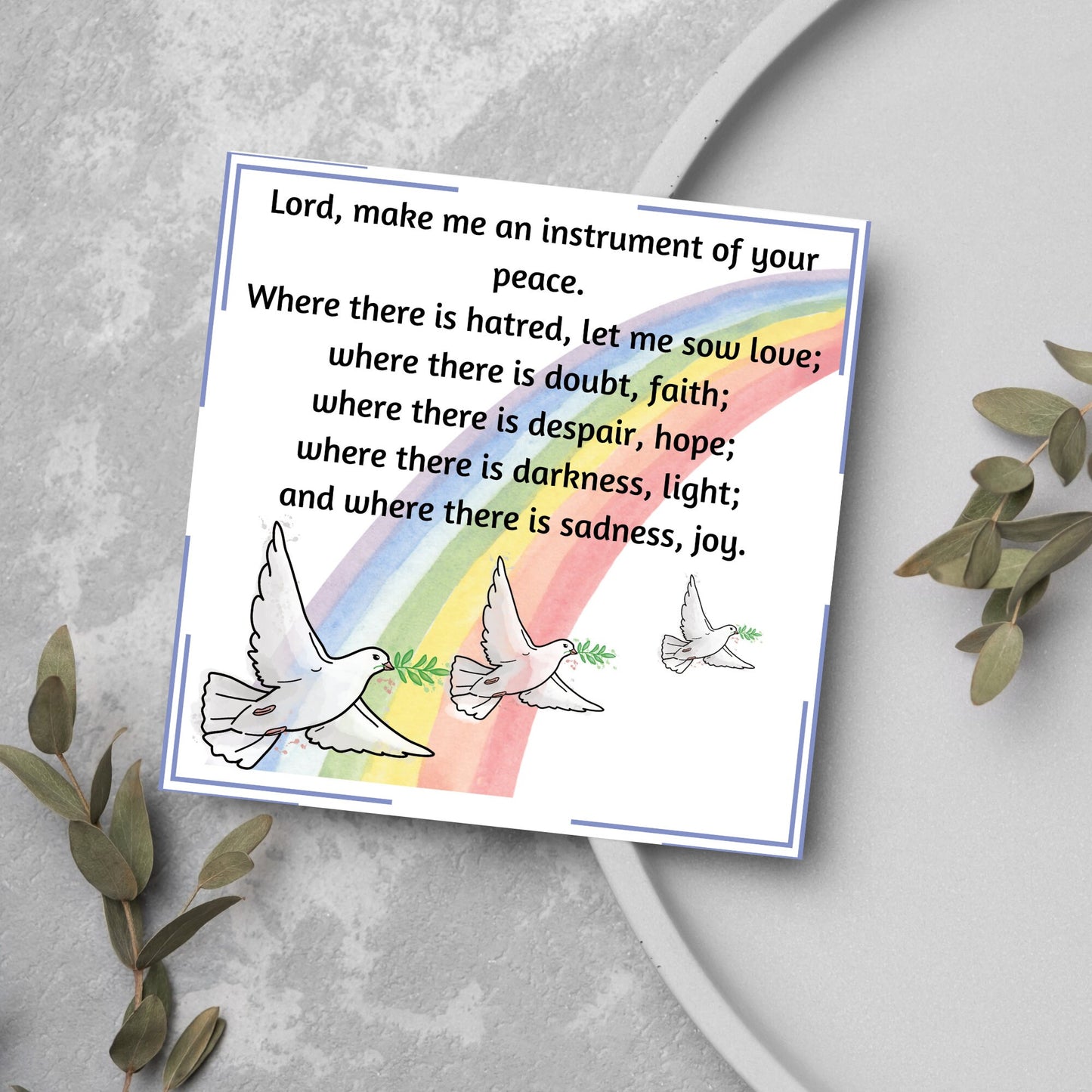 Square greetings card with 3 flying peace doves against a rainbow, with the Prayer of Saint Francis text Lord, make me an instrument of your peace.
