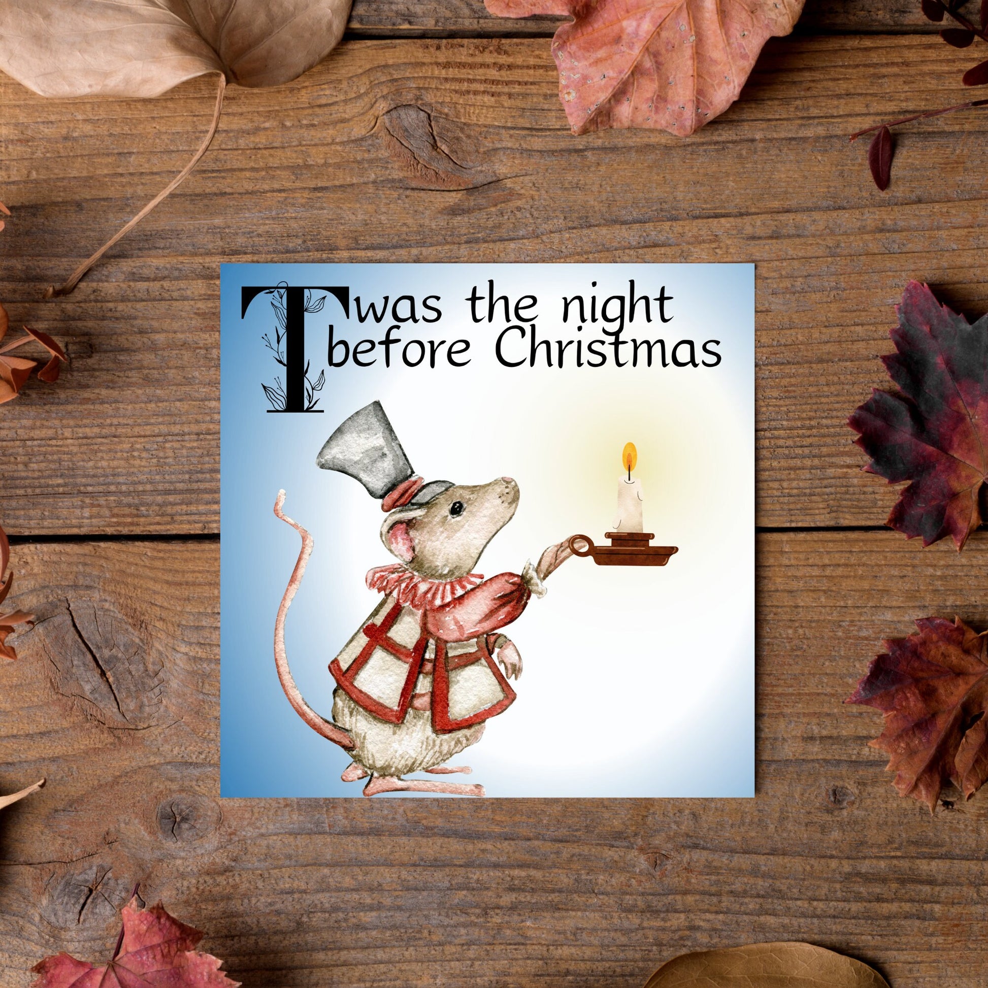 Square Christmas card with a Dickensian Mouse holding a candle in the dark. The mouse is dressed in Victorian clothes and the text 'twas the night before christmas' is written across the top of the card