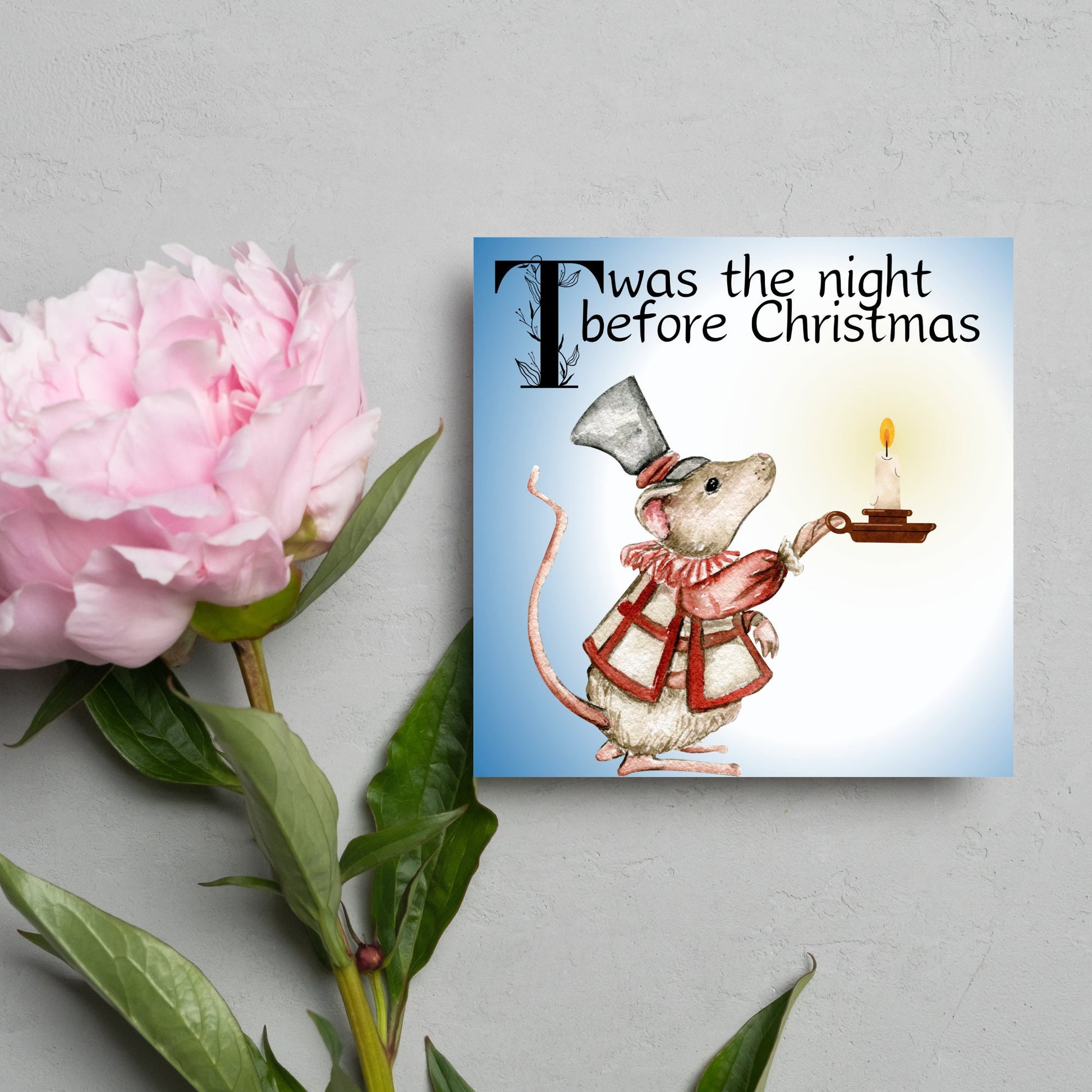 Square Christmas card with a Dickensian Mouse holding a candle in the dark. The mouse is dressed in Victorian clothes and the text 'twas the night before christmas' is written across the top of the card