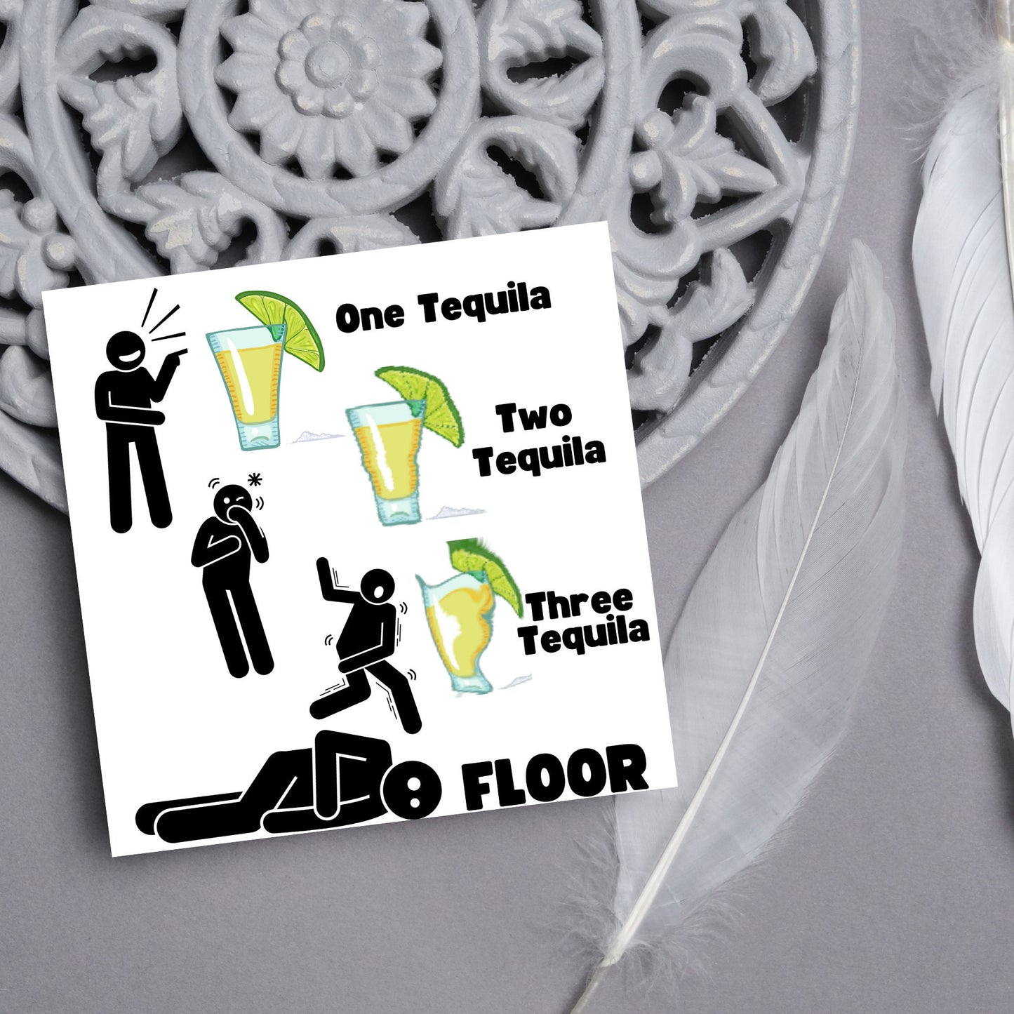 Square greetings card with four stick men in different stages of inebriation and 3 glasses of Tequila and the phrase 'One tequila, two tequila, three tequila, FLOOR'