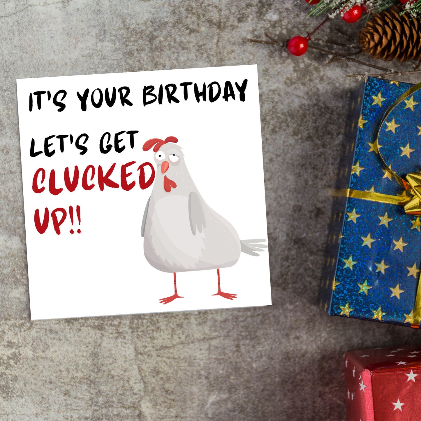 Square birthday card with a drunk looking cartoon chicken and the text 'it's your birthday, lets get clucked up!!'
