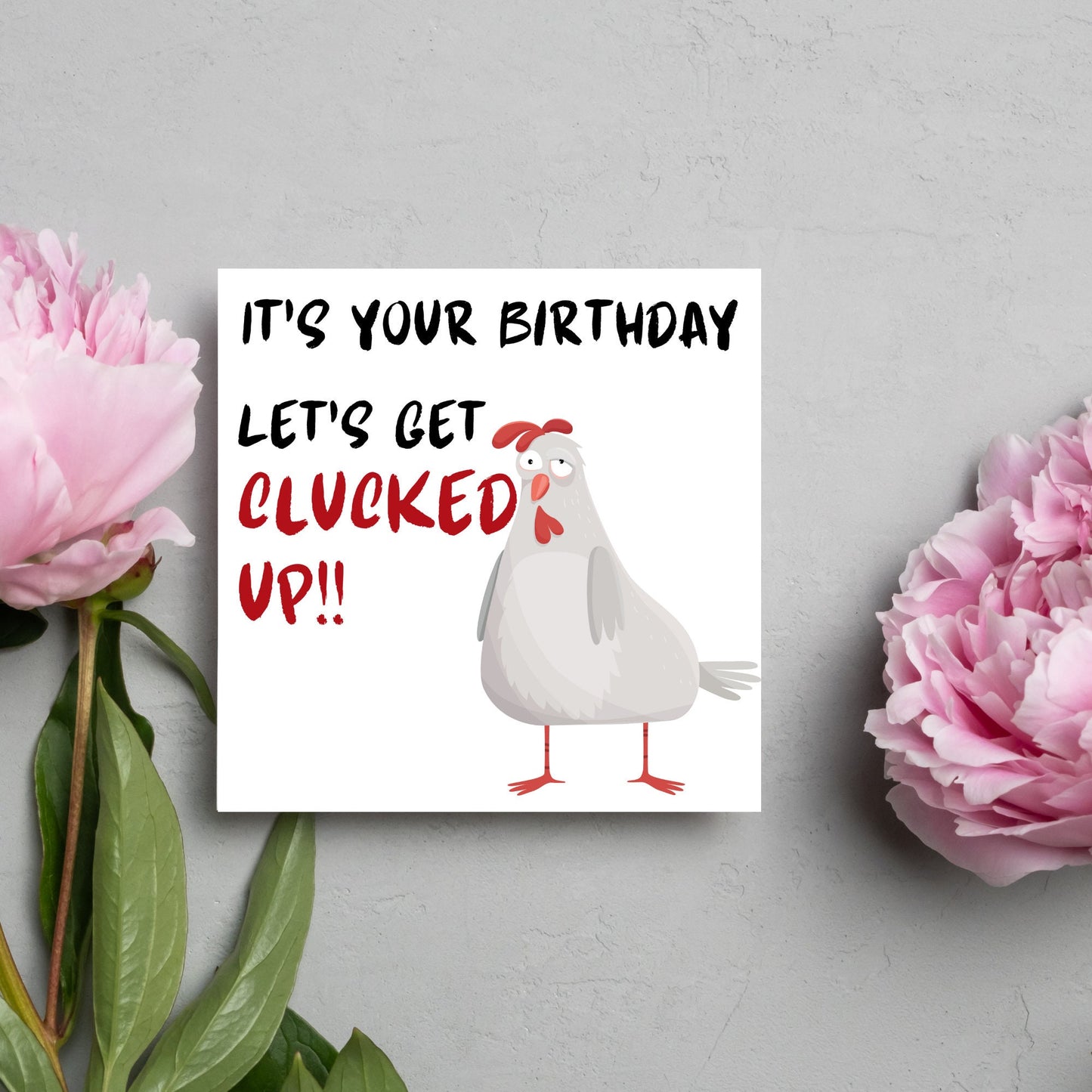 Square birthday card with a drunk looking cartoon chicken and the text 'it's your birthday, lets get clucked up!!'