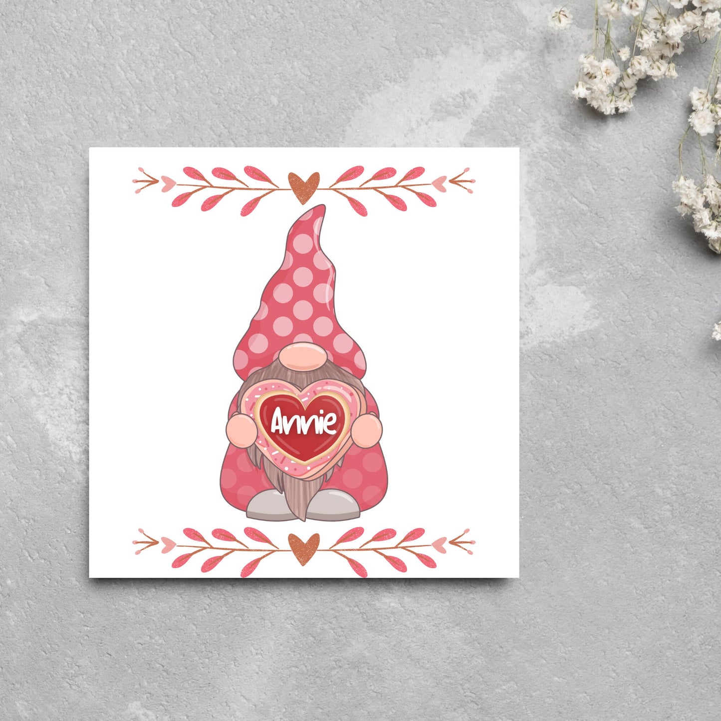 The Square Card has a cute gonk holding a love heart with a perssonalised name, the card has a cute heart header and footer, The Card is a cute representation of love, The Card is perfect for your valentines