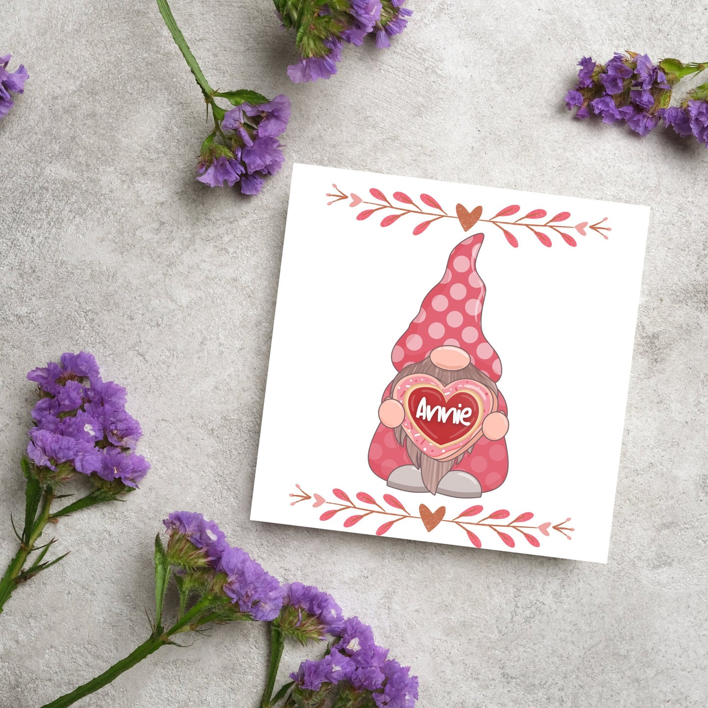 The Square Card has a cute gonk holding a love heart with a perssonalised name, the card has a cute heart header and footer, The Card is a cute representation of love, The Card is perfect for your valentines