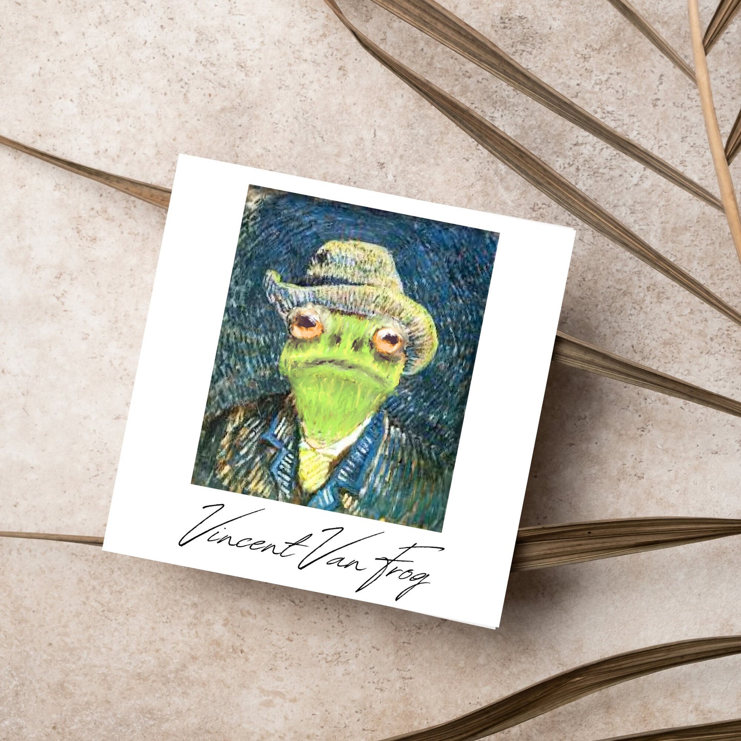 Image of a square greetings card with a remake of Vincent Van Gogh's famous self portrait but redone into a frog face. Underneath the painting the text reads Vincent Van Frog in a signature style
