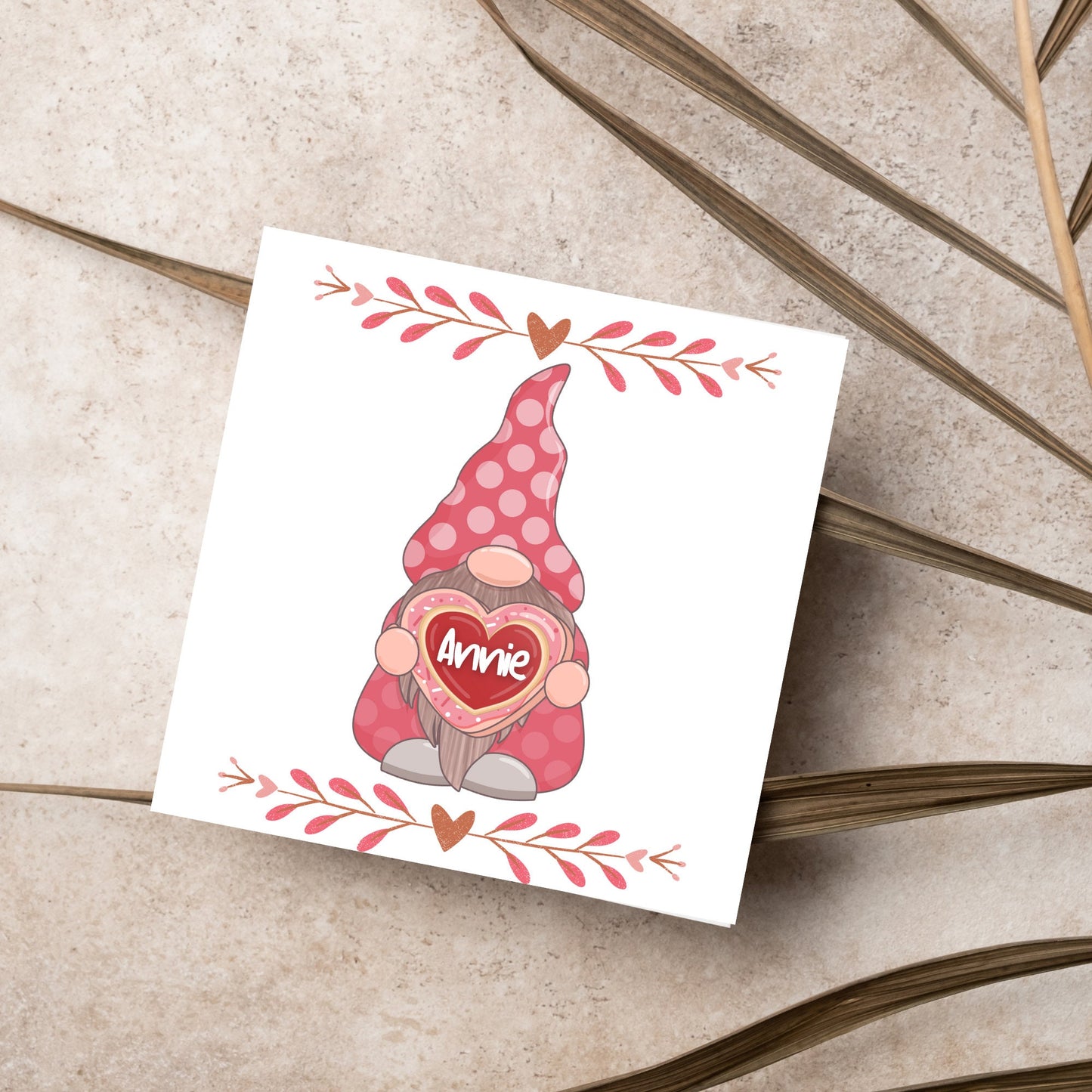 The Square Card has a cute gonk holding a love heart with a perssonalised name, the card has a cute heart header and footer, The Card is a cute representation of love, The Card is perfect for your valentines