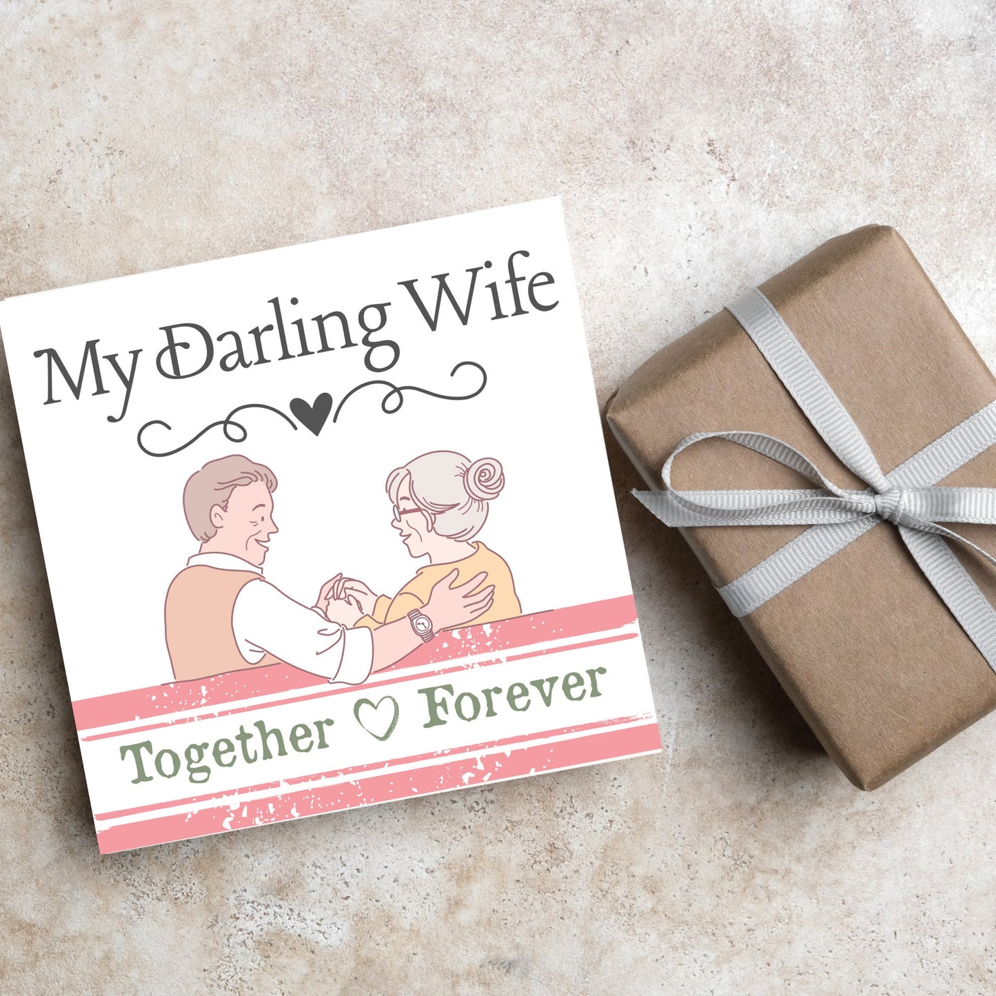 The Card has an illistration of a married couple holding hands. The Caption Reads 'My Darling Wife - Together Forever'. The Card is printed in pastel tones and is perfect for anniversaries or valentines day.