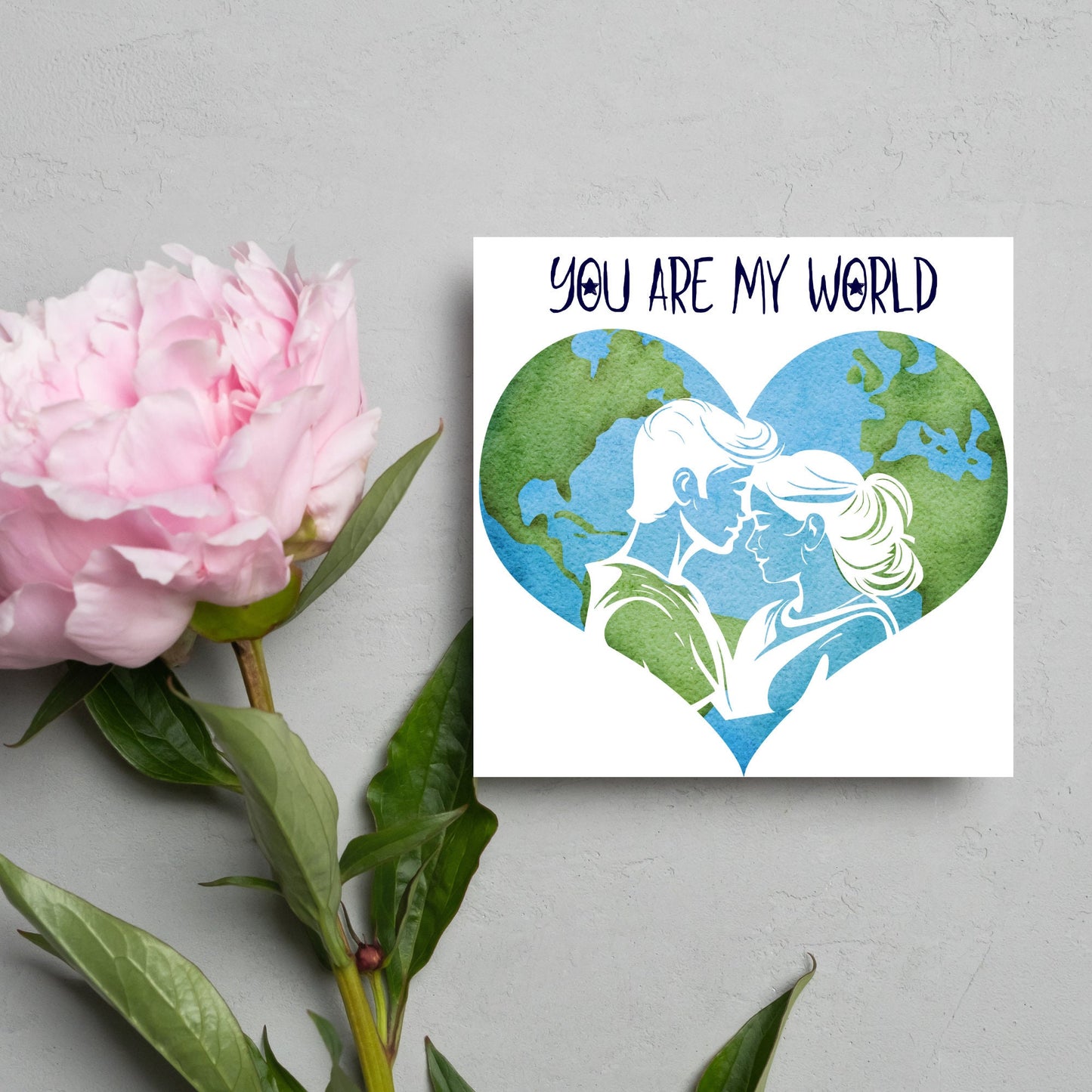 The Square Card has the year in a traditional heart love shape, with a couple embracing eachother. The caption reads "You are my World" This valentines day card is perfect for loved ones, for boyfriend, for girlfriend, for wife, for husband