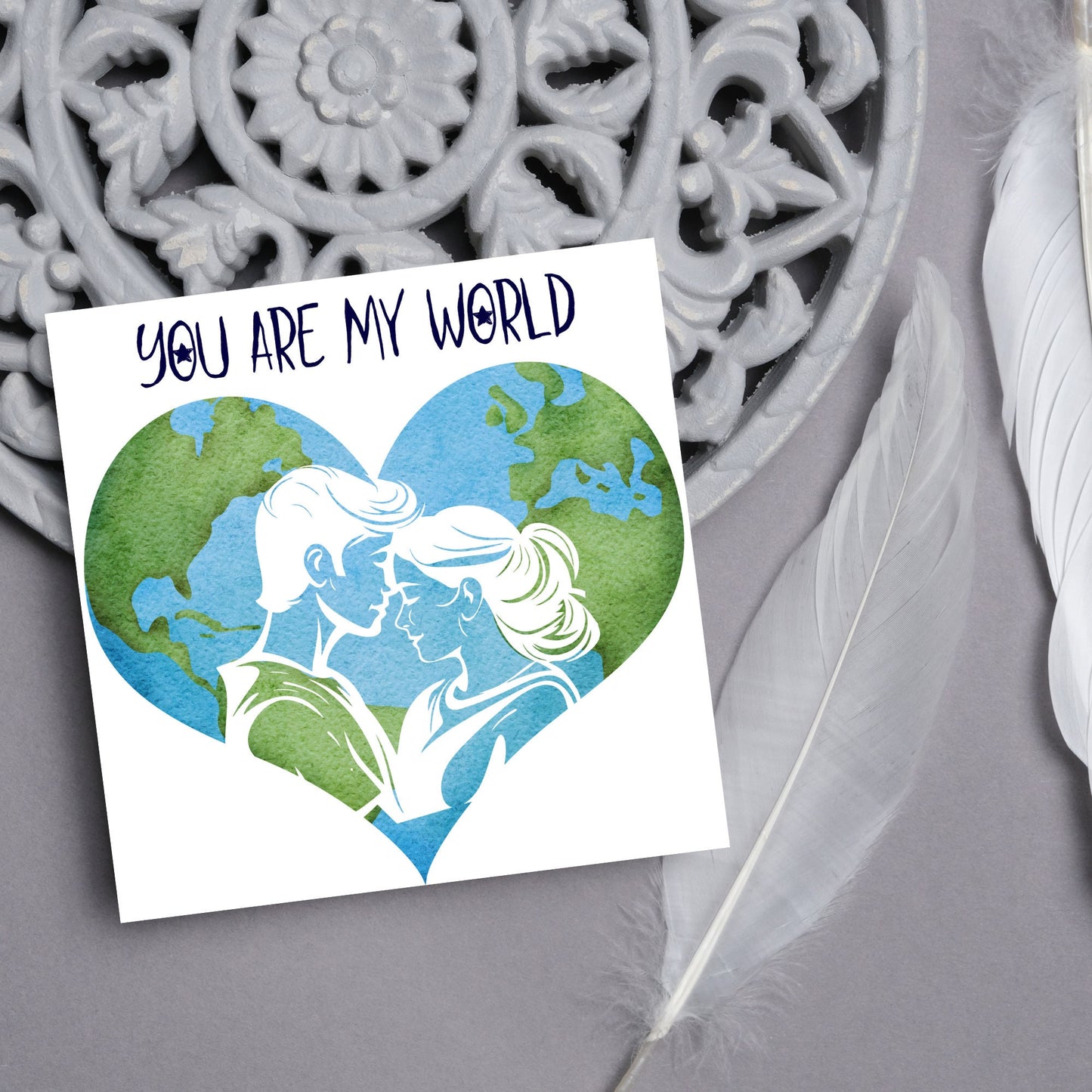 The Square Card has the year in a traditional heart love shape, with a couple embracing eachother. The caption reads "You are my World" This valentines day card is perfect for loved ones, for boyfriend, for girlfriend, for wife, for husband