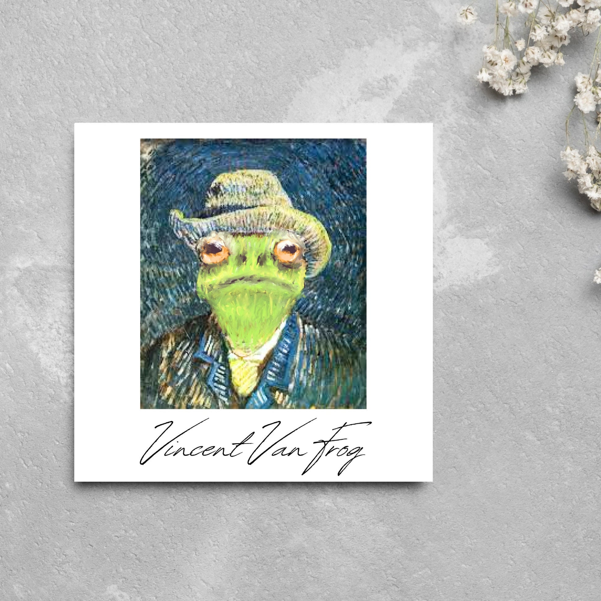 Image of a square greetings card with a remake of Vincent Van Gogh's famous self portrait but redone into a frog face. Underneath the painting the text reads Vincent Van Frog in a signature style