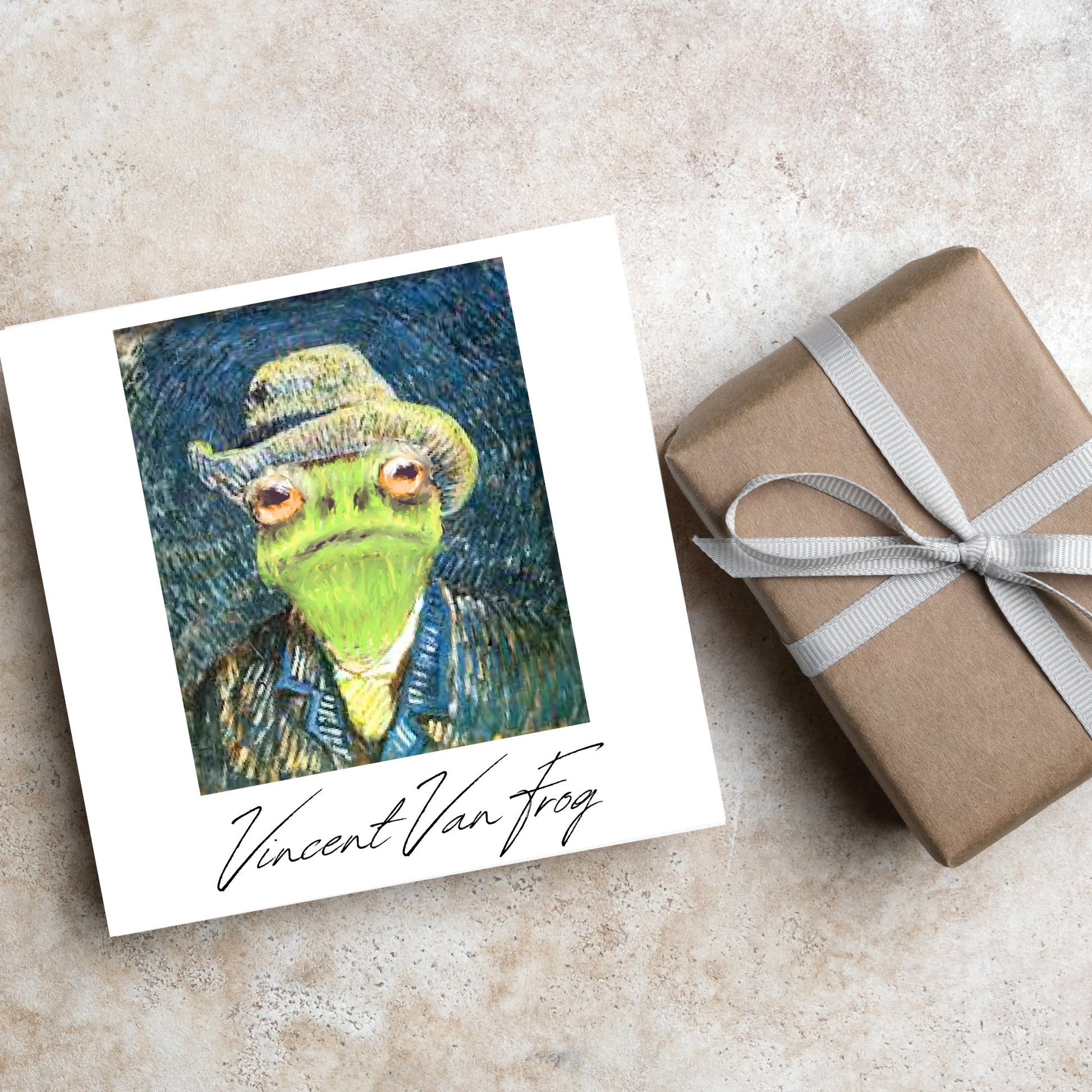 Image of a square greetings card with a remake of Vincent Van Gogh's famous self portrait but redone into a frog face. Underneath the painting the text reads Vincent Van Frog in a signature style