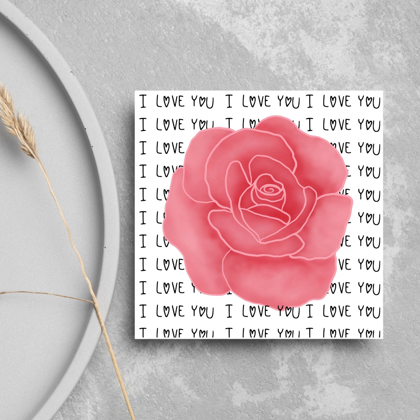simple elegant card for valentines or anniversary, featuring a large pink rose painting with a background of handwritten style text that repeats 'I love you' with hearts instead of o's