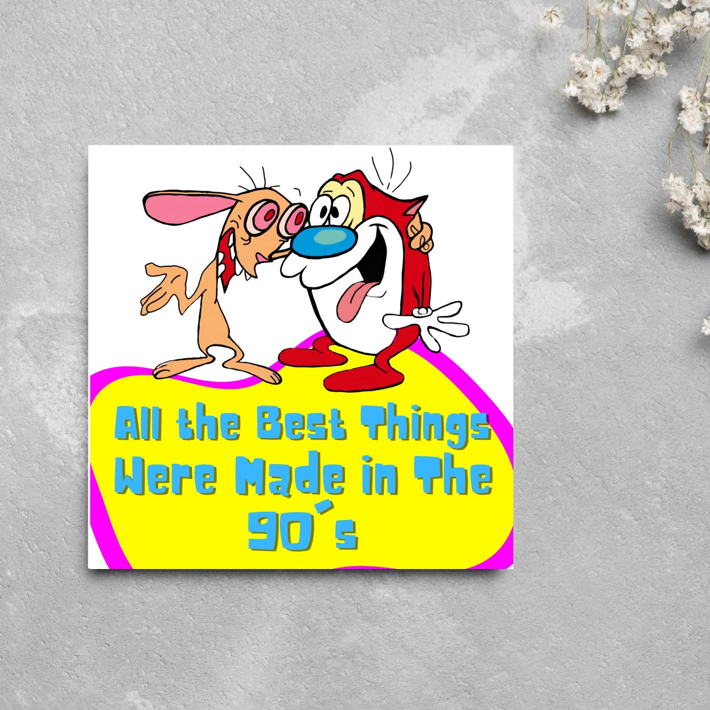 square card featuring an illustration of Ren and Stimpy arm in arm with blue pink and yellow text that reads 'all the best things were' made in the 90's' in the font from the shows title