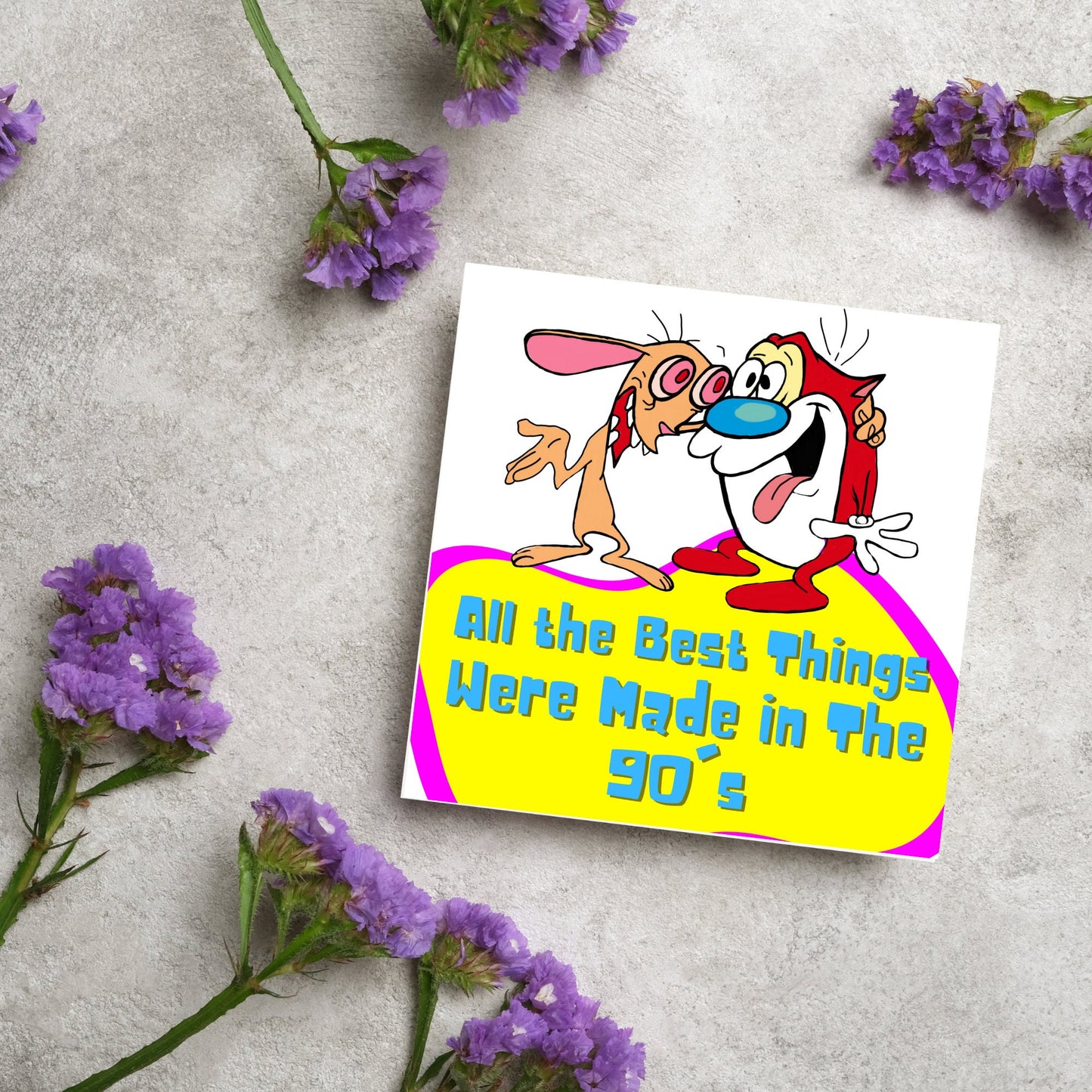 square card featuring an illustration of Ren and Stimpy arm in arm with blue pink and yellow text that reads 'all the best things were' made in the 90's' in the font from the shows title