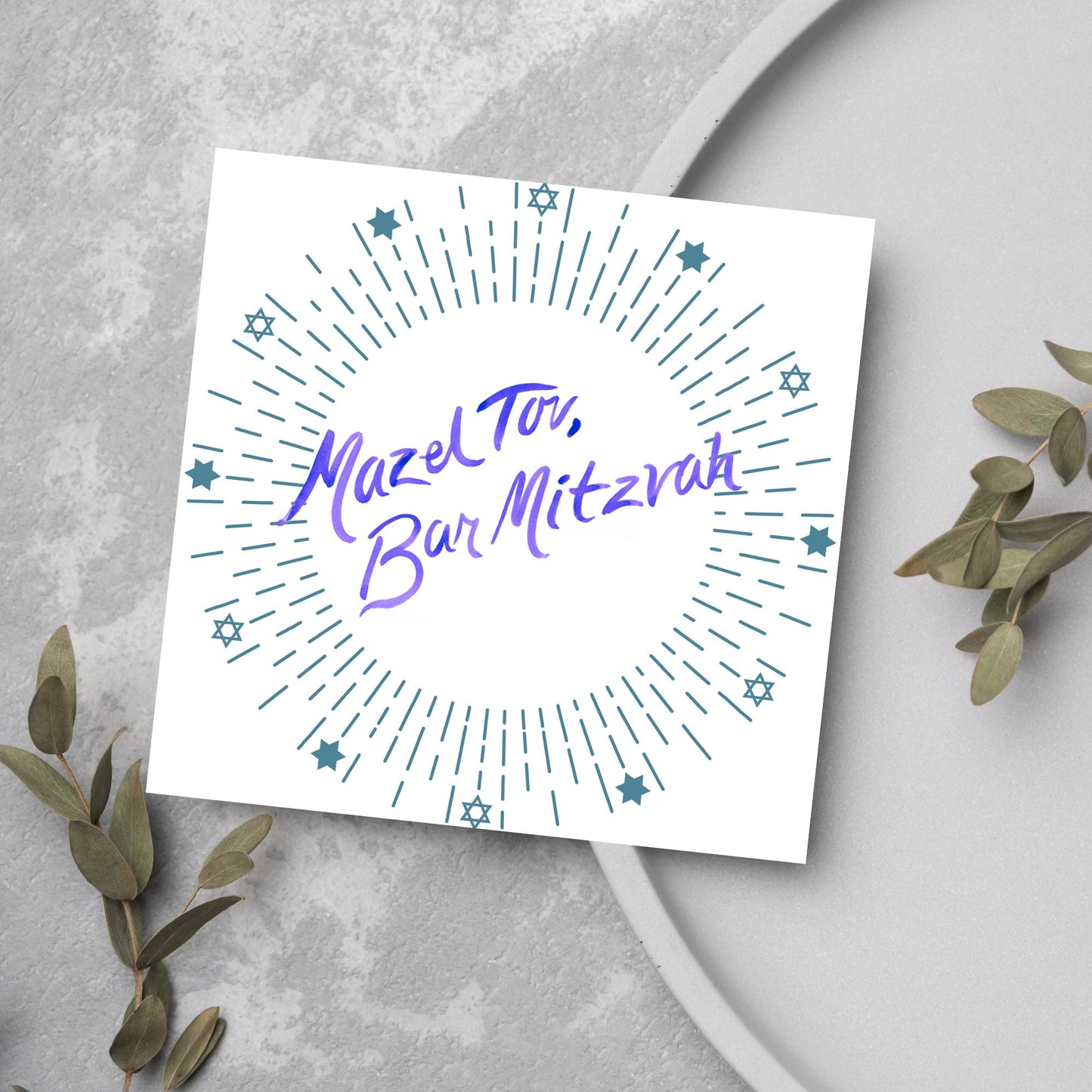 square bar mitzvah card with a white background and the text 'mazel tav, bar mitzvah' in the centre in a blue handwritten script style font. Surrounding the text is a circle made of concentric blue lines and 12 stars of david