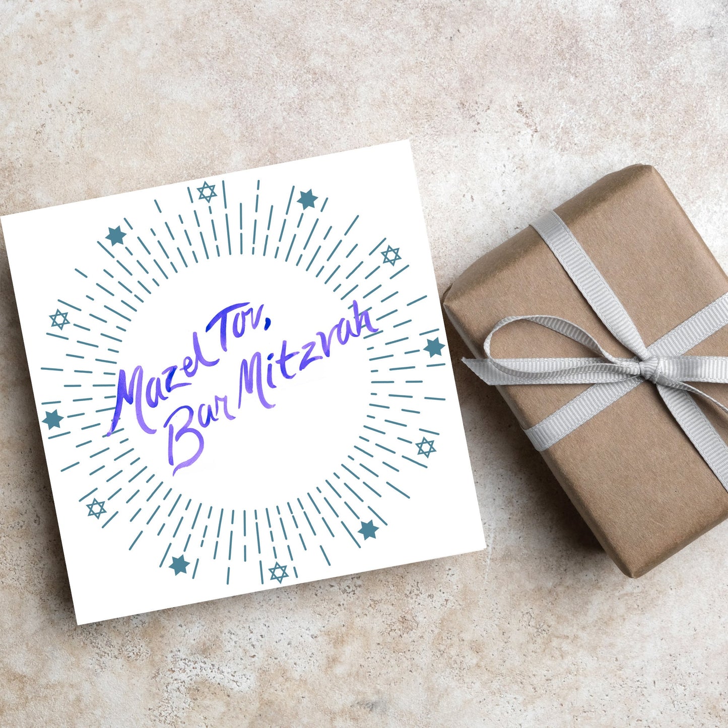 square bar mitzvah card with a white background and the text 'mazel tav, bar mitzvah' in the centre in a blue handwritten script style font. Surrounding the text is a circle made of concentric blue lines and 12 stars of david