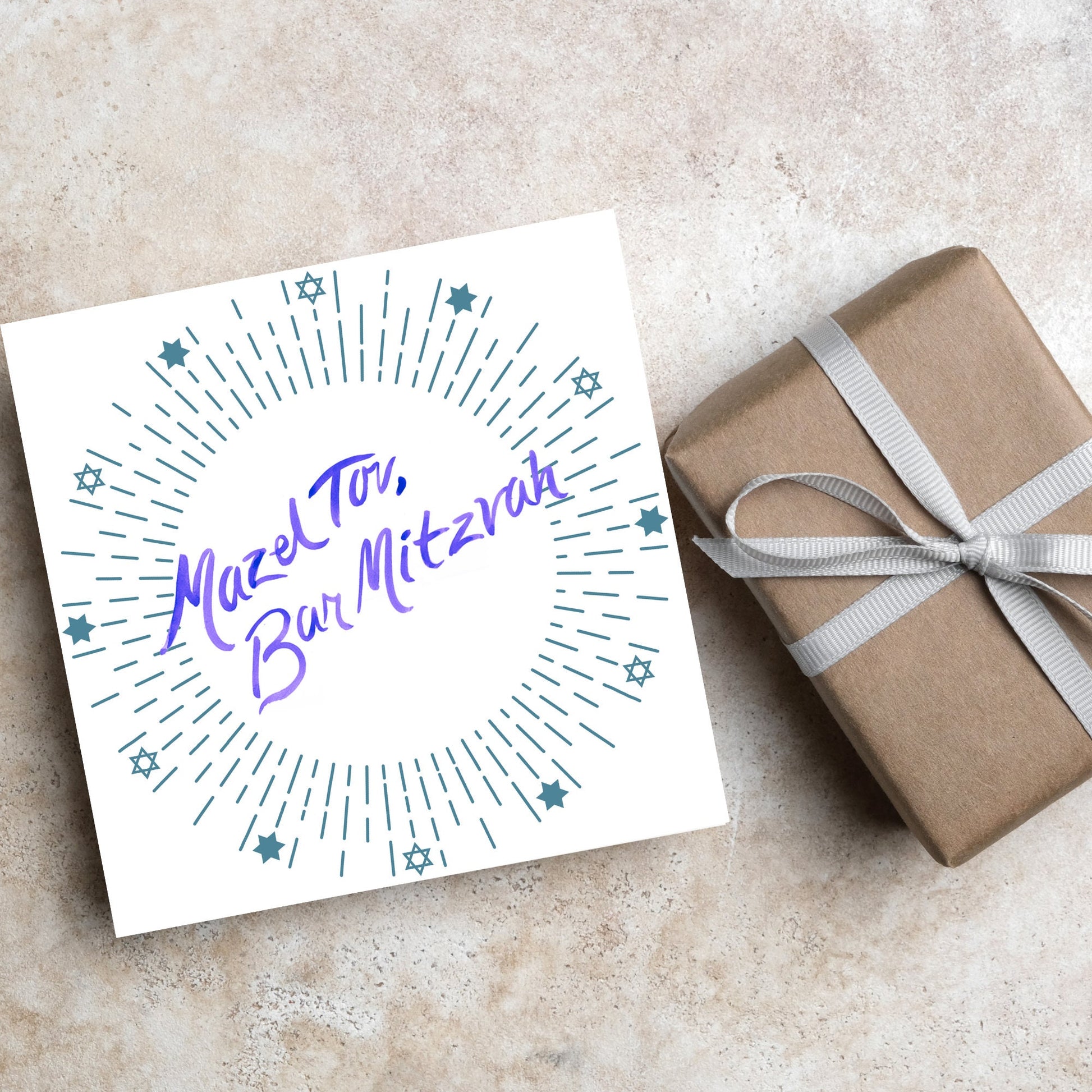 square bar mitzvah card with a white background and the text 'mazel tav, bar mitzvah' in the centre in a blue handwritten script style font. Surrounding the text is a circle made of concentric blue lines and 12 stars of david