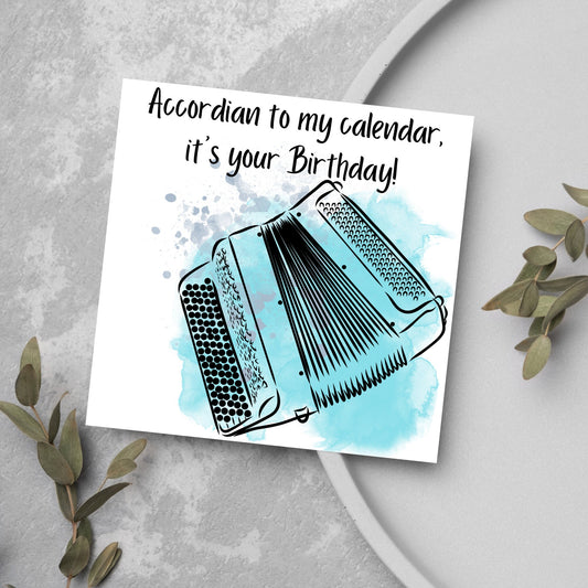 Image of a square greetings card against a grey background. The design is a watercolour accordion with the text accordian to my calendar it's your birthday!
