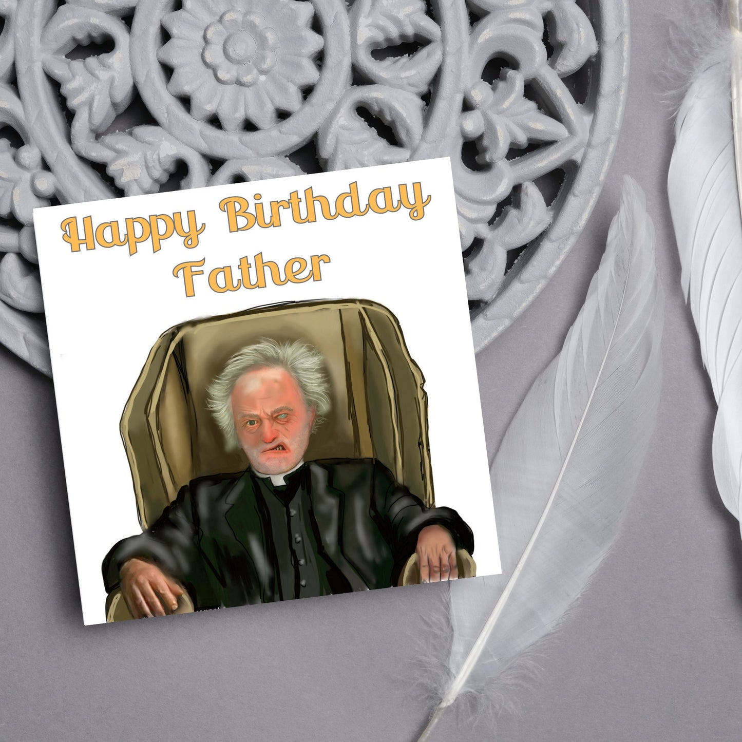 square birthday card with a hand drawn image of father jack from the tv show father ted. he is sitting in his chair looking mean with the text happy birthday father