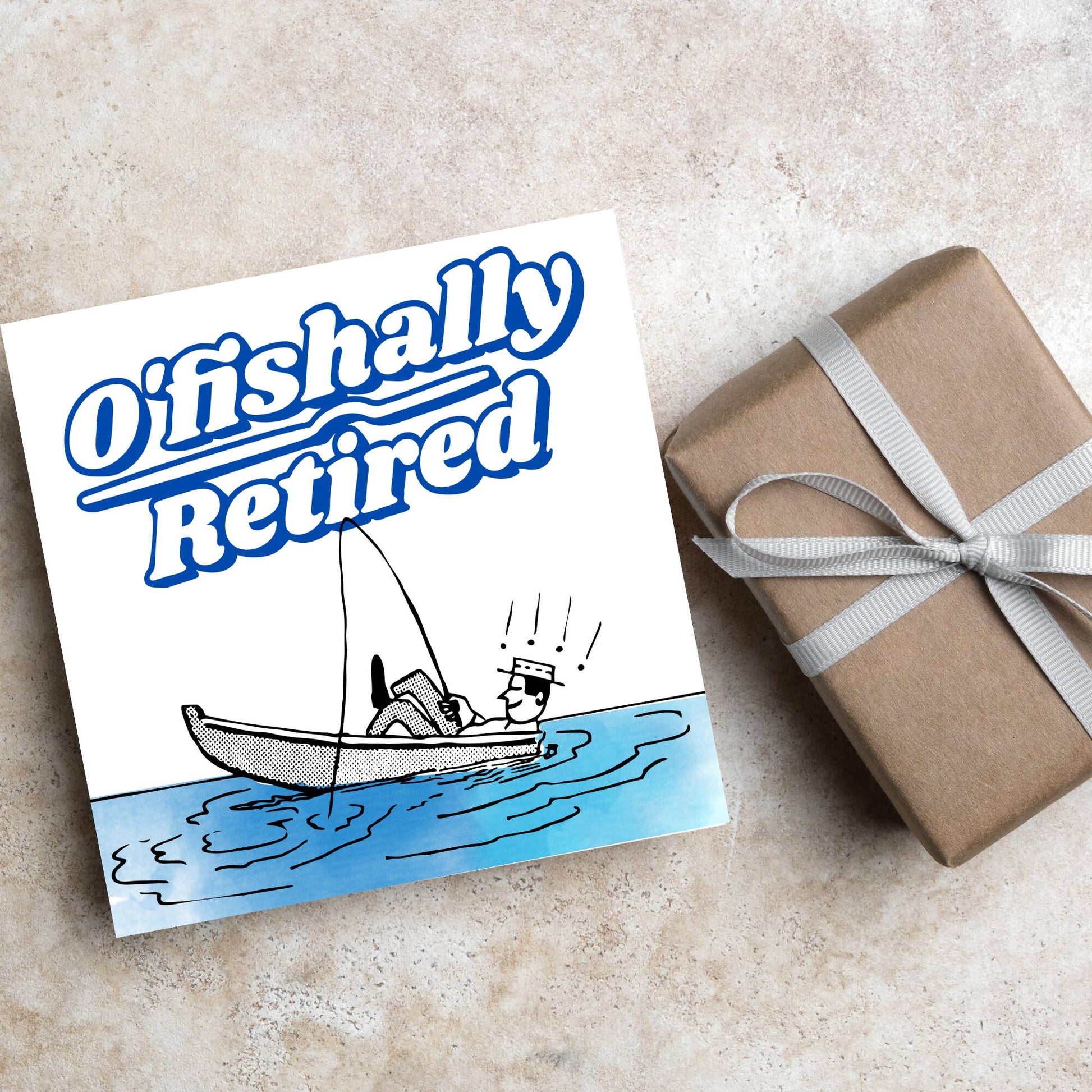 square card with a cartoon of a man in a boat looking happy and relaxed with a fishing rod. big blue and white text reads - ofishally retired'