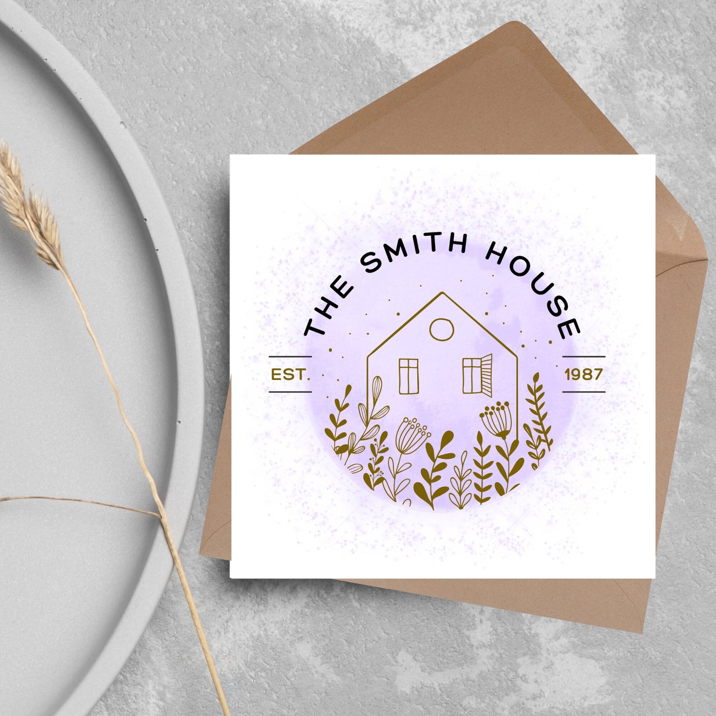 square card with a purple watercolour circle with a line drawing of a house and foliage over it. Arched text reads the smith house on top with est 1987 running through the centre