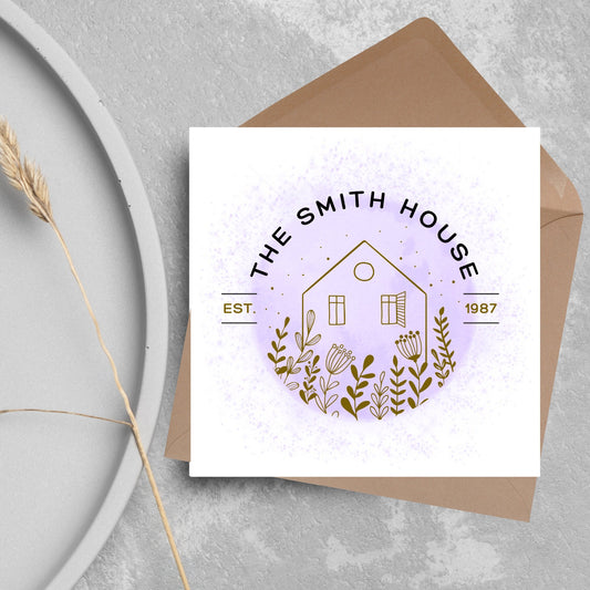 square card with a purple watercolour circle with a line drawing of a house and foliage over it. Arched text reads the smith house on top with est 1987 running through the centre