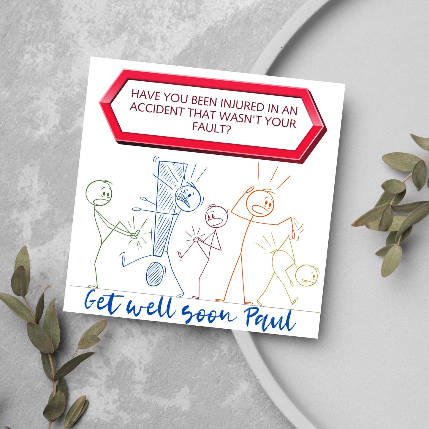 Square Get well soon card with a red sign which says have you been injured in an accident that wasn't your fault? above stick person cartoons of various injuries. Underneath is a handwritten style message that reads get well soon paul