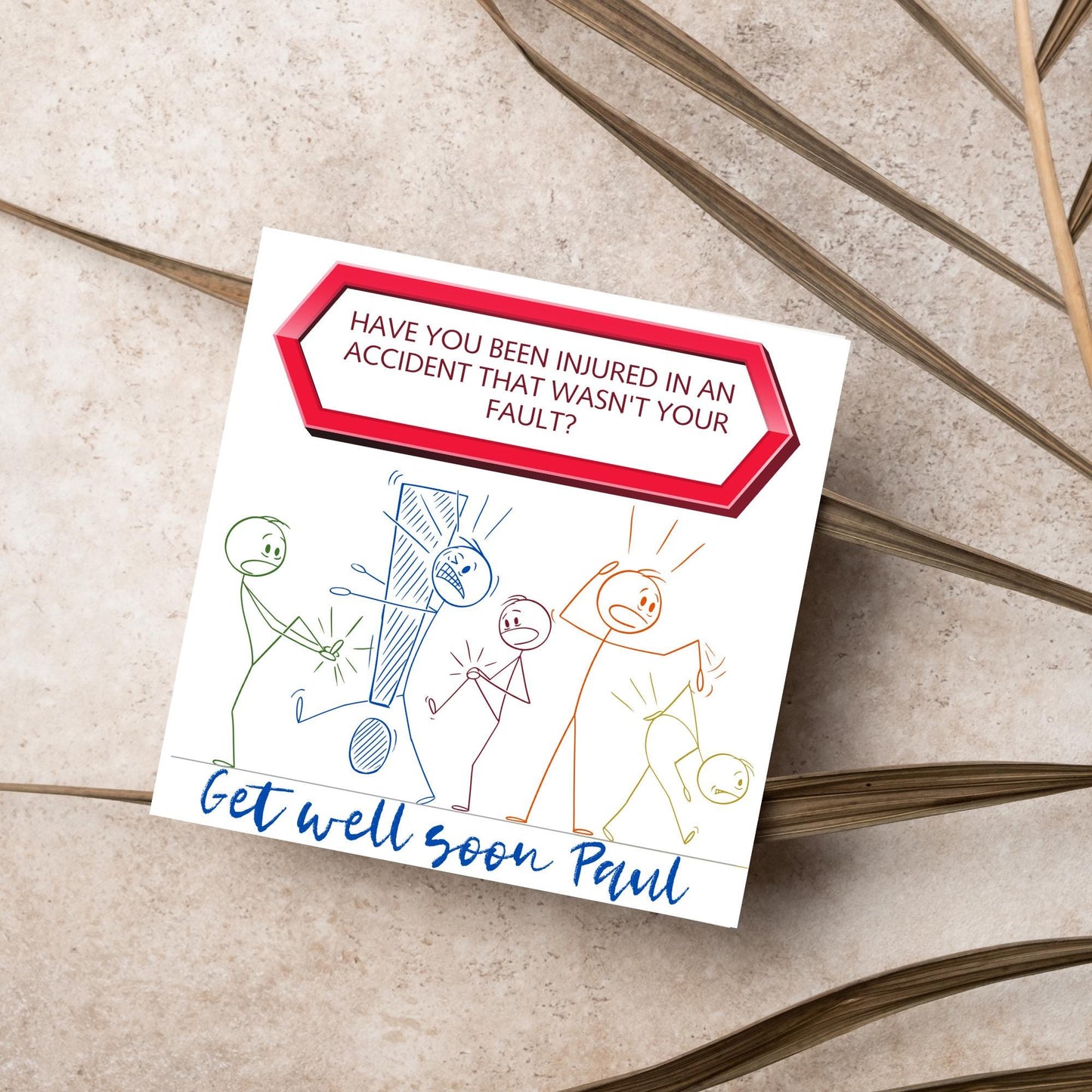 Square Get well soon card with a red sign which says have you been injured in an accident that wasn't your fault? above stick person cartoons of various injuries. Underneath is a handwritten style message that reads get well soon paul