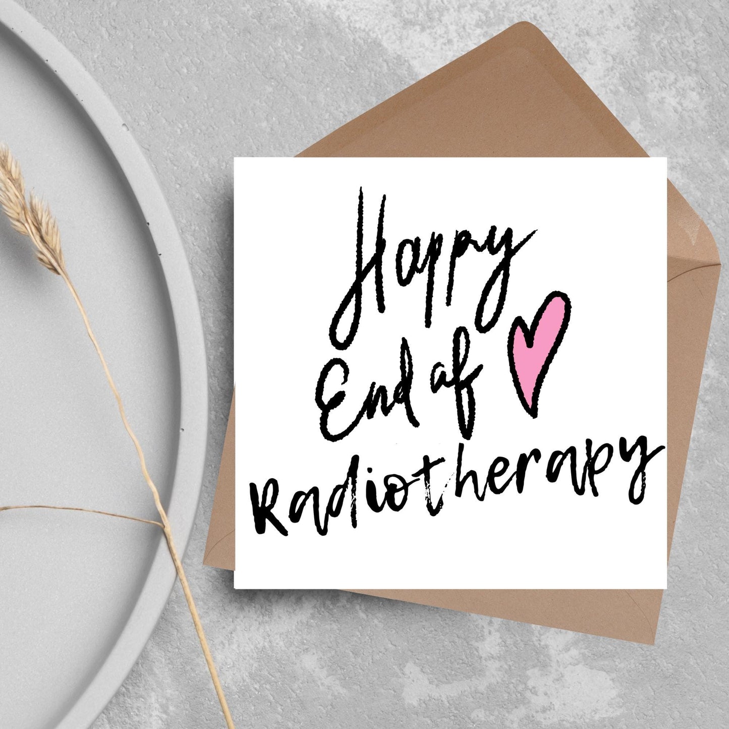 Simple square card with a white backdrop and black handwritten style text that reads HAPPY END OF RADIOTHERAPY with a roughly drawn pink heart next to the text.