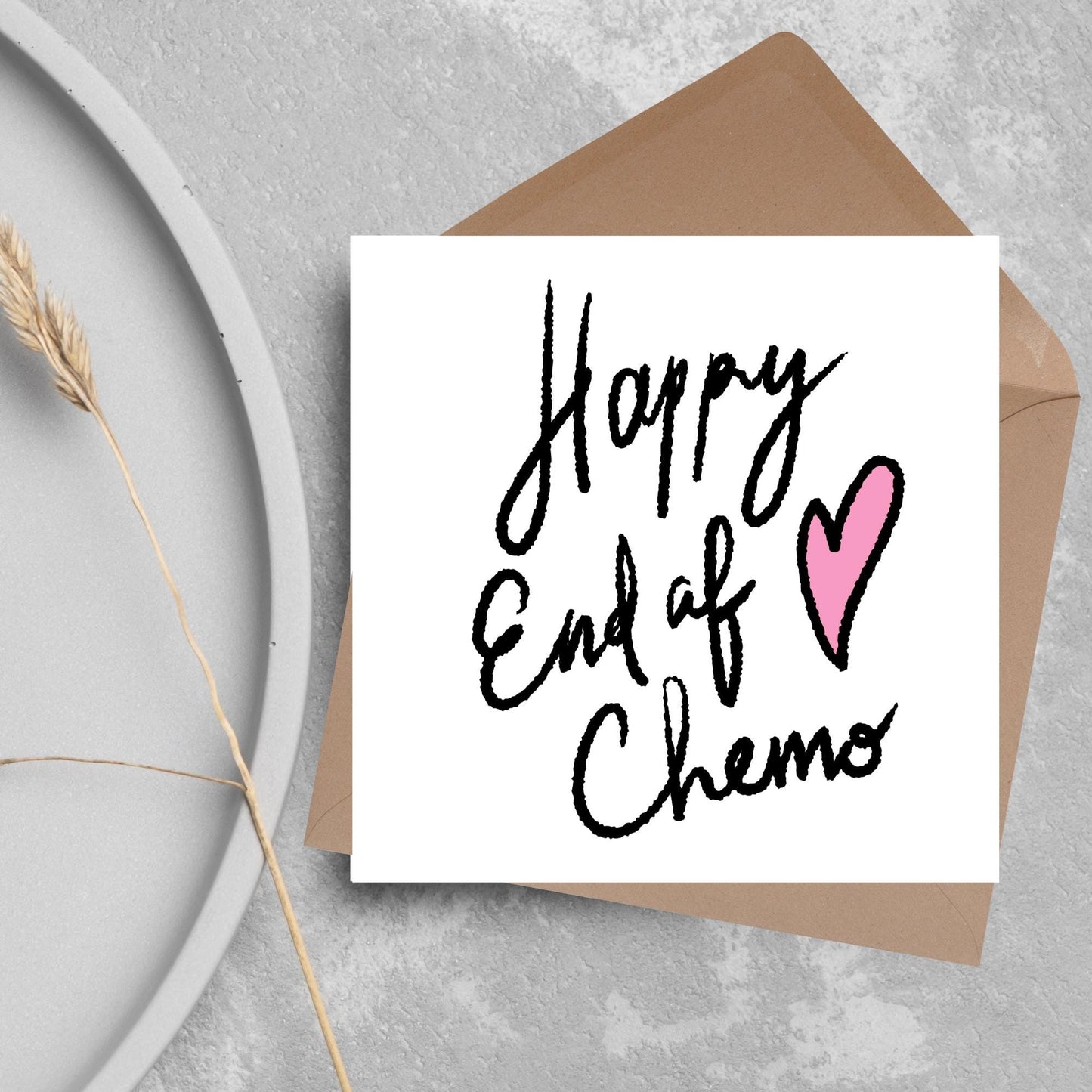 Simple square card with a white backdrop and black handwritten style text that reads HAPPY END OF CHEMO with a roughly drawn pink heart next to the text.