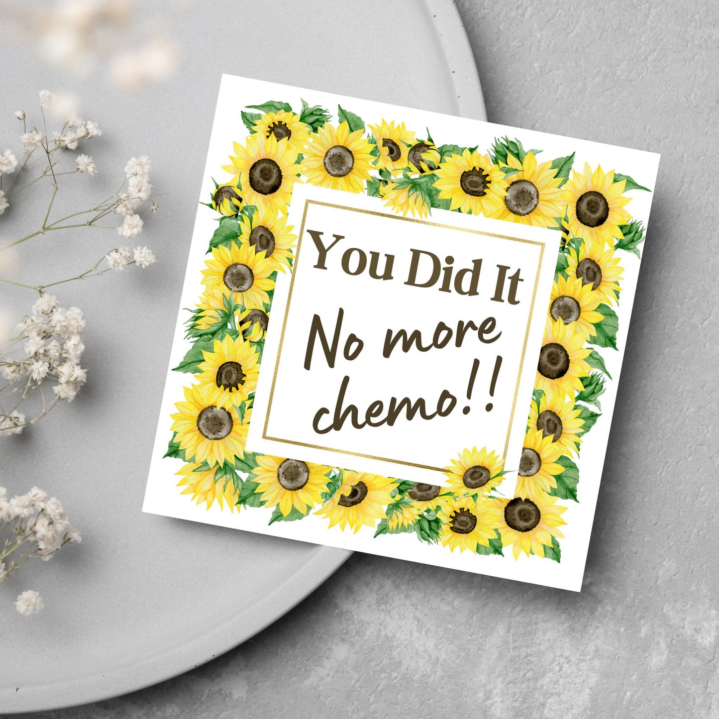 square greetings card with a w atercolour border of sunflowers framing the text - You did it no more chemo - in a subtle brown font