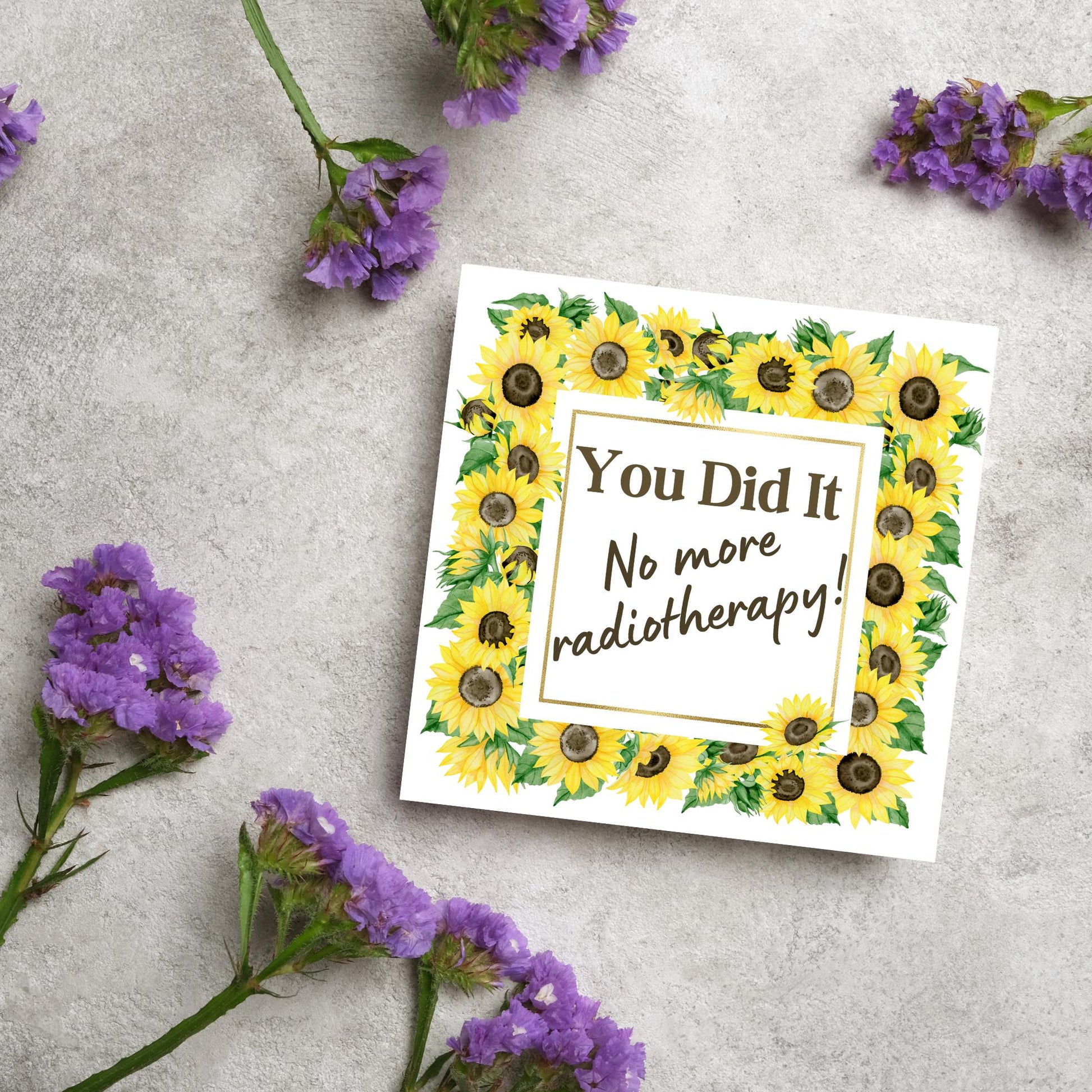 square greetings card with a watercolour border of sunflowers framing the text - You did it no more radiotherapy - in a subtle brown font