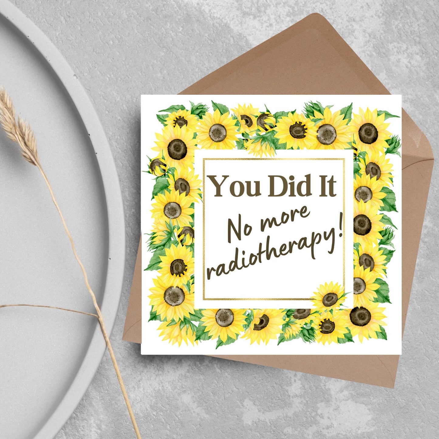 square greetings card with a watercolour border of sunflowers framing the text - You did it no more radiotherapy - in a subtle brown font