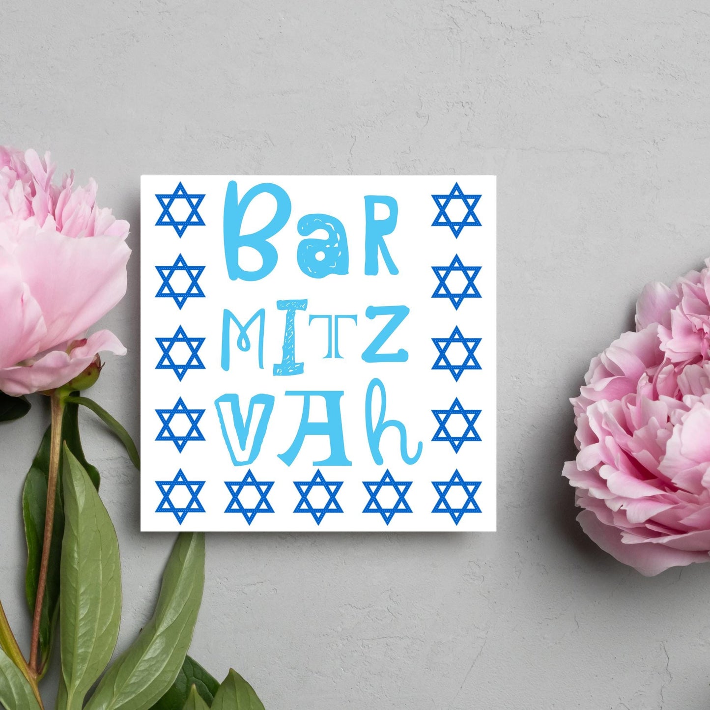 square greeting card for bar mitzvah with blue text bar mitzvah in a hand drawn style made of different fonts surrounded by 13 stars of David in navy blue
