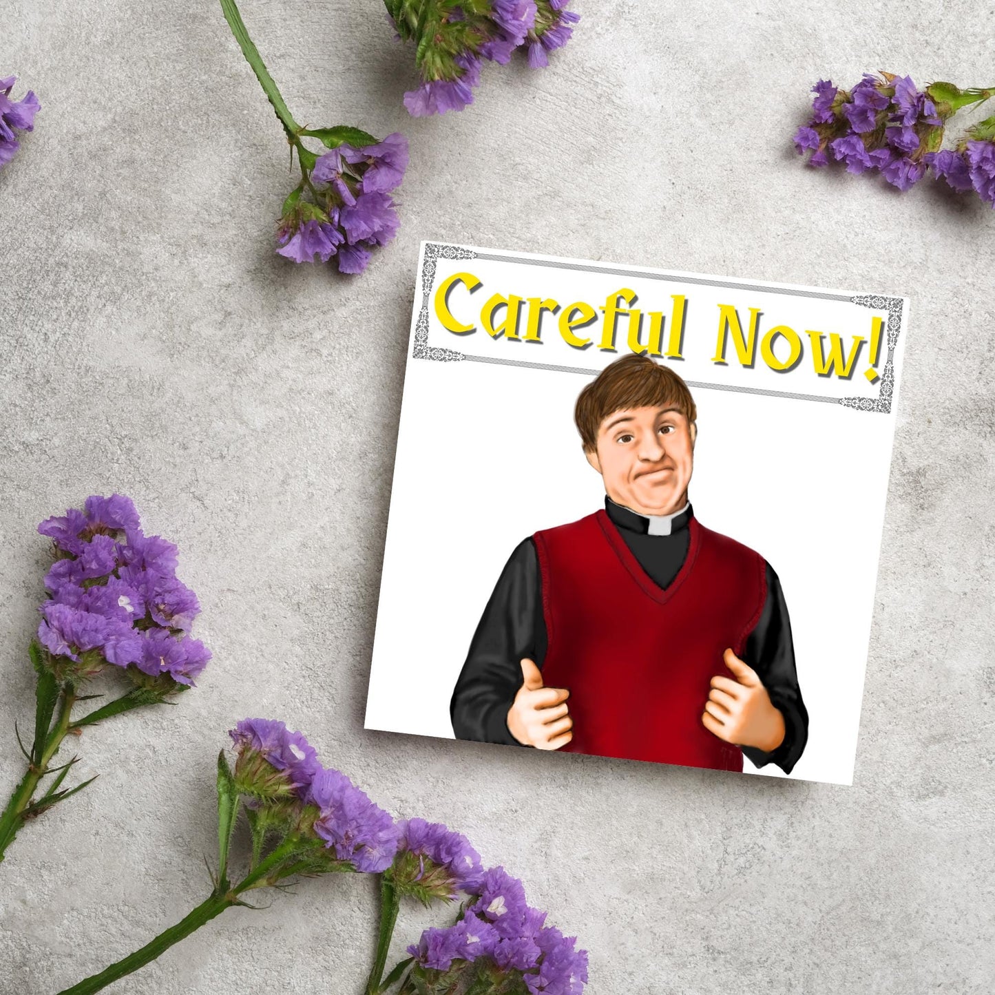 Square card with a hand drawn image of father dougal from the tv show father ted, with his thumbs up and a cheeky smile. At the top of the card is the text careful now in a similar style to the shows title