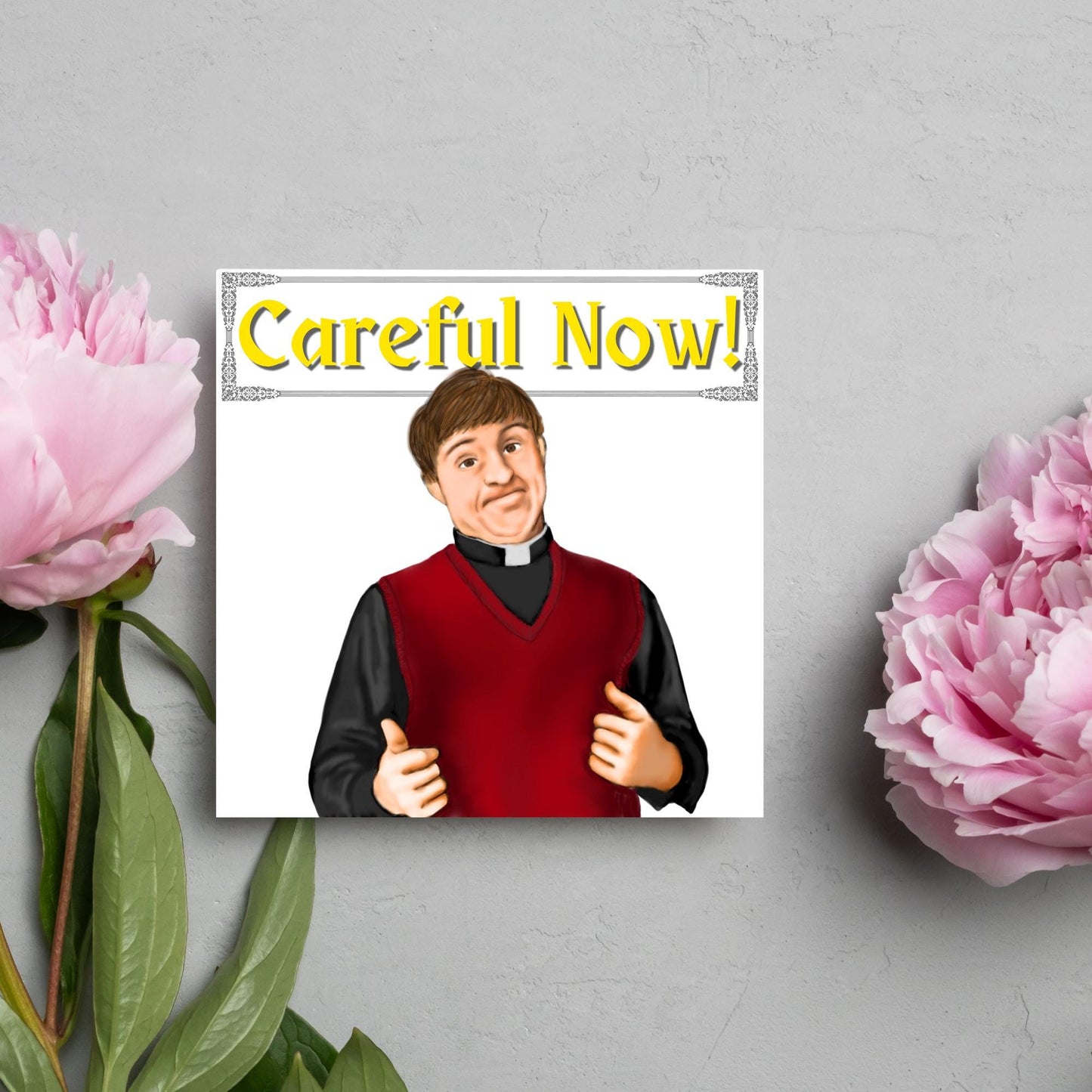Square card with a hand drawn image of father dougal from the tv show father ted, with his thumbs up and a cheeky smile. At the top of the card is the text careful now in a similar style to the shows title